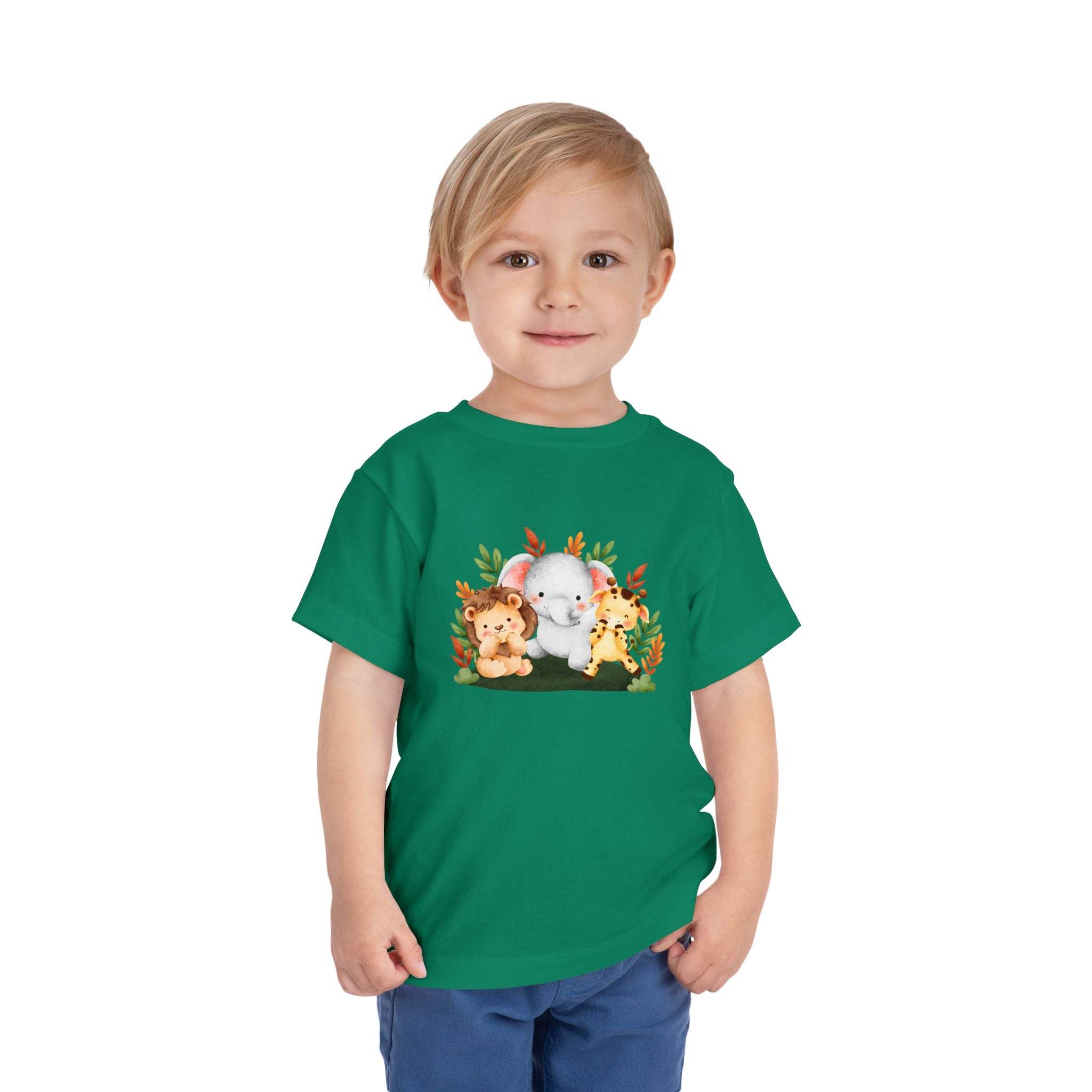 Child wearing an eco-friendly kids t-shirt by Printify with cute animal graphic in green