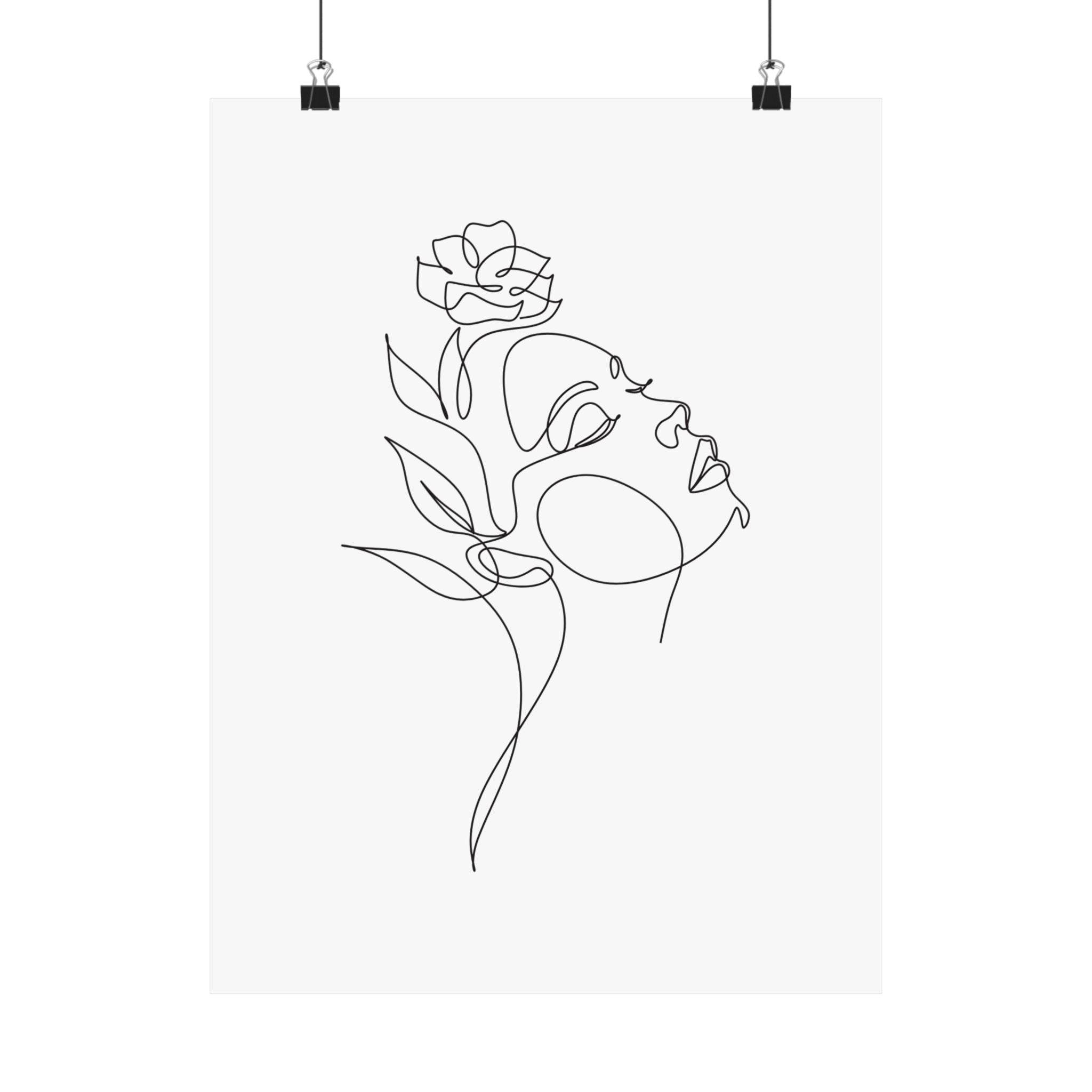 Minimalist line art poster of a woman's face with flower printed on eco-friendly matte posters