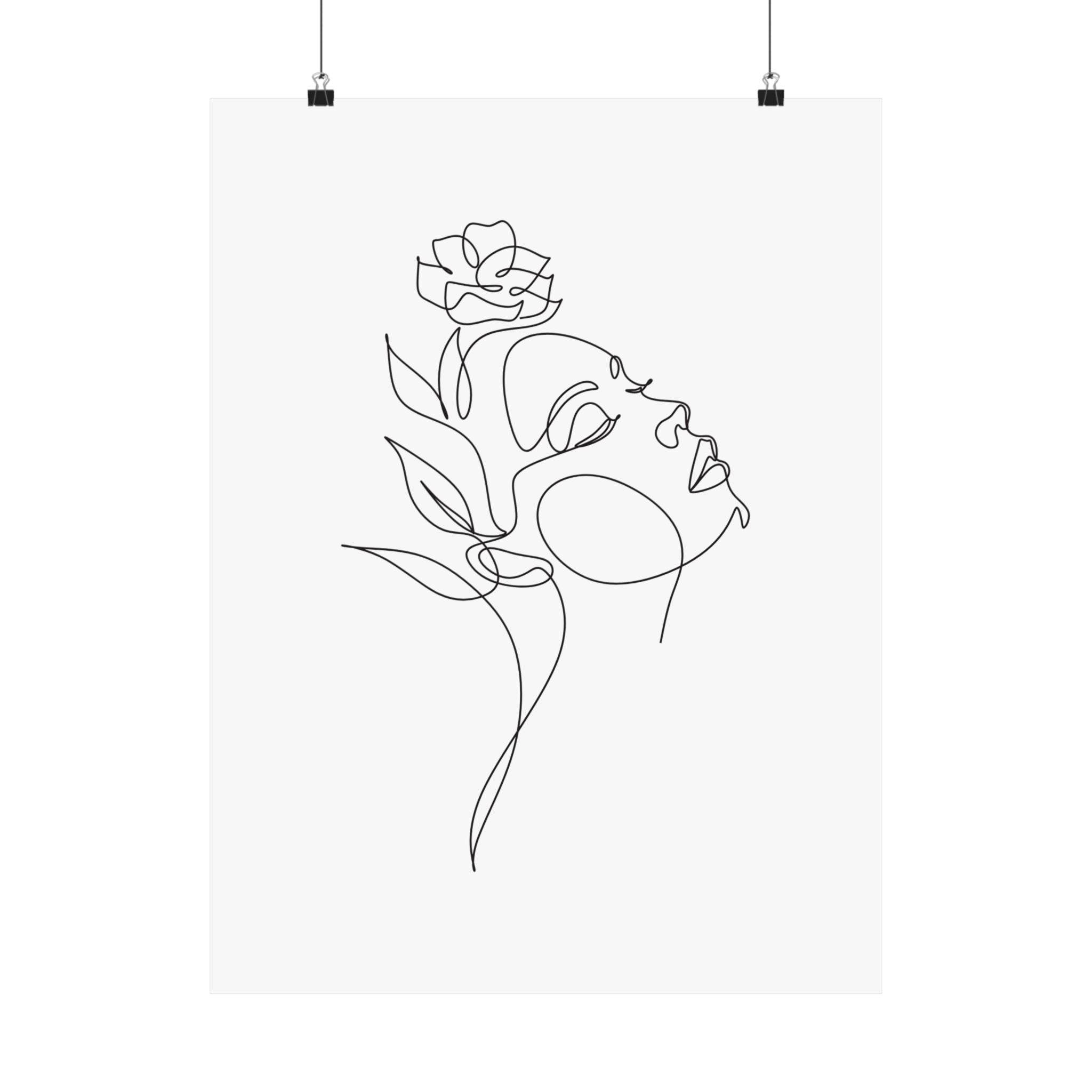 Minimalist line art poster of a woman's face with a flower printed on eco-friendly matte posters by Printify