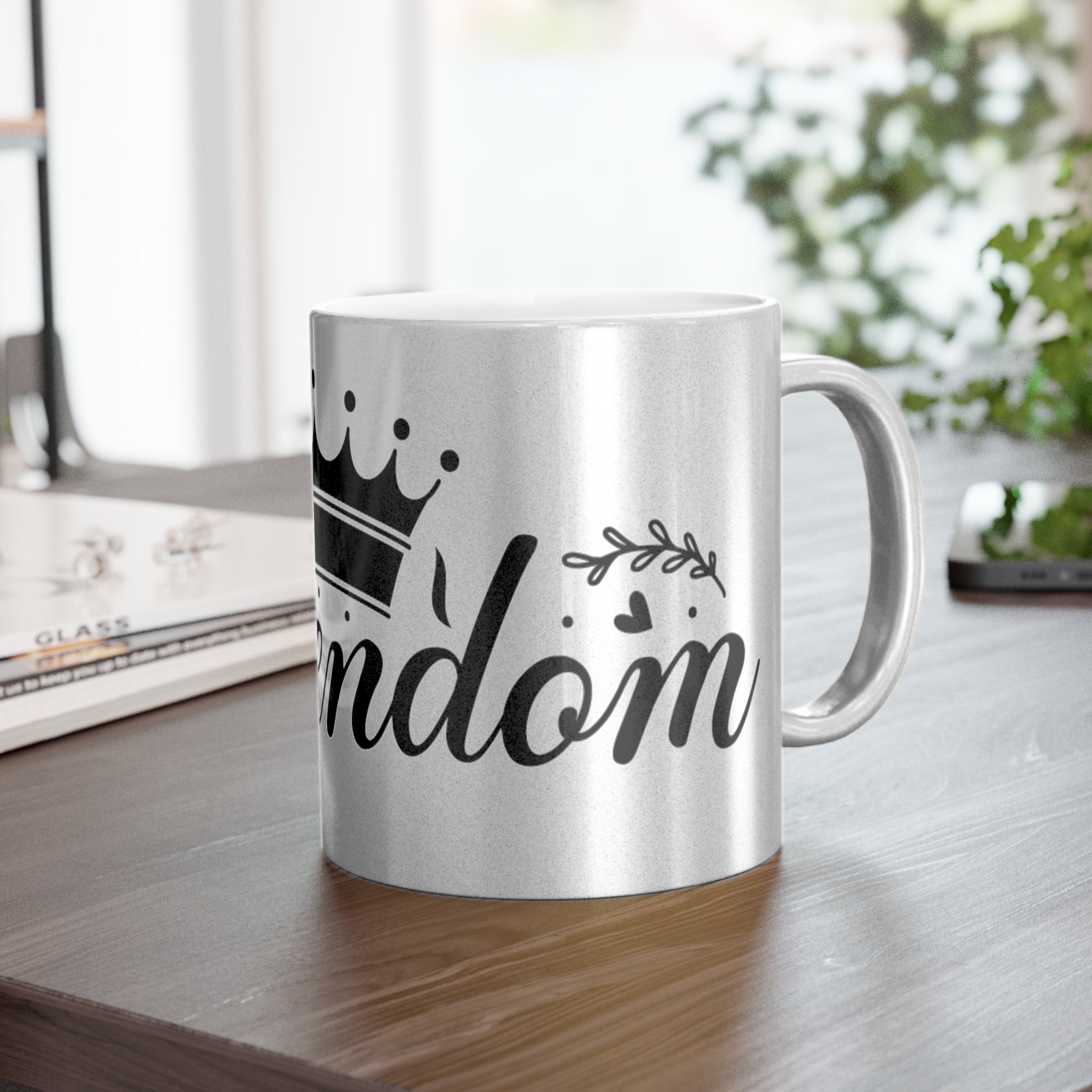 Printify eco-friendly metallic mug with black crown and random design on a wooden table