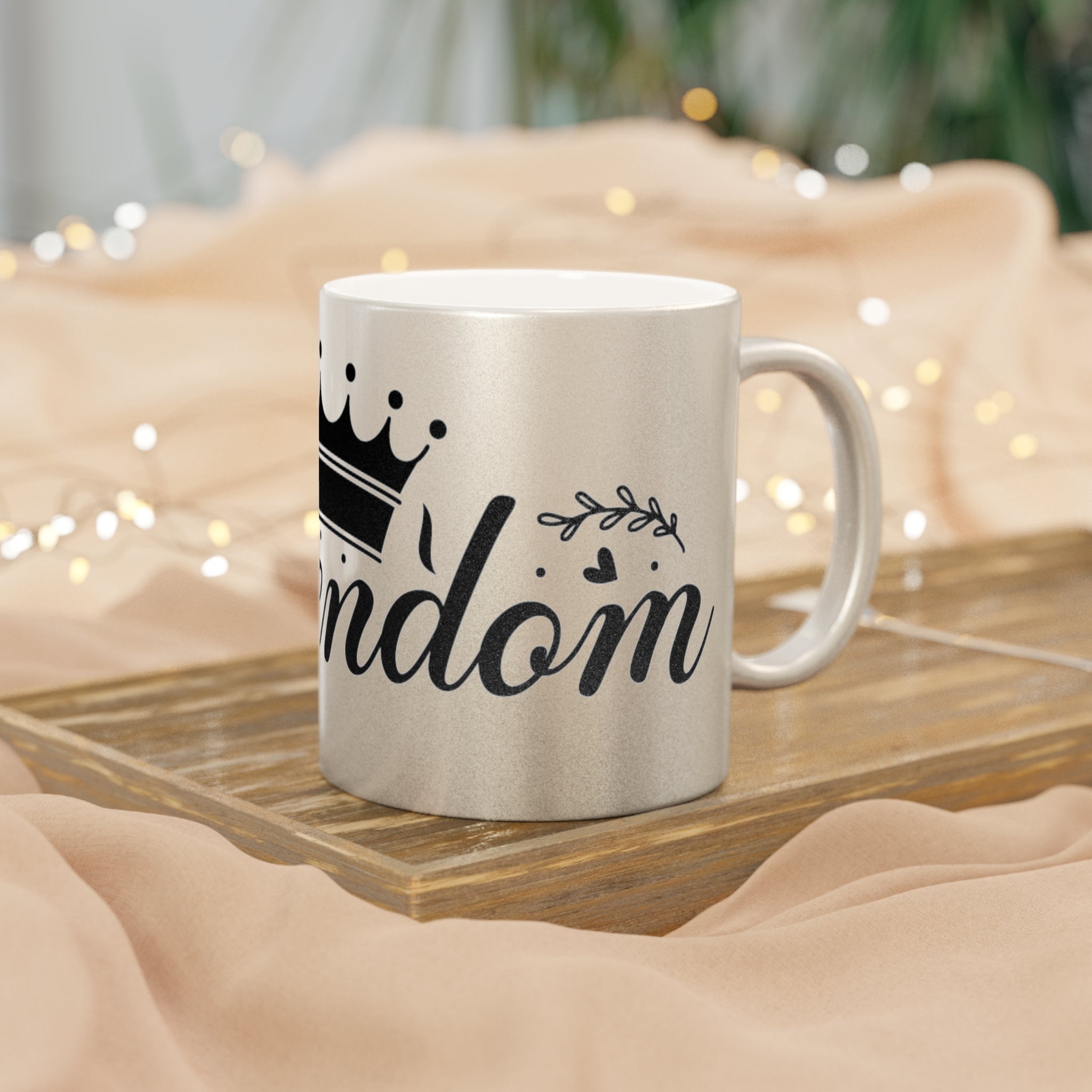 Printify eco-friendly metallic mug with black crown design on wooden tray and soft beige background