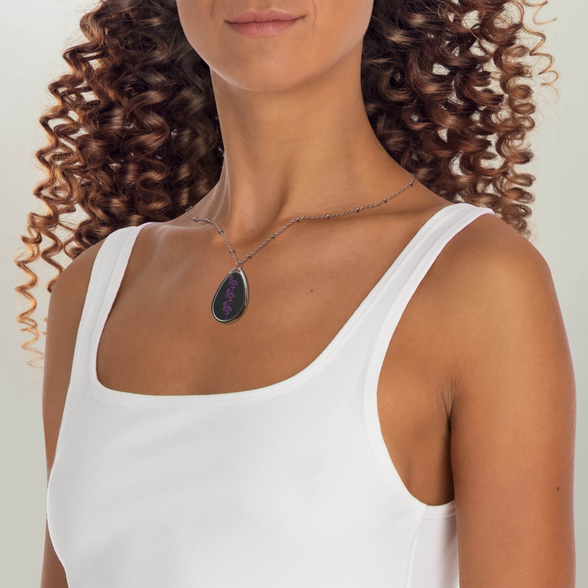 Woman wearing an eco-friendly neon necklace with a teardrop pendant and delicate chain by Printify