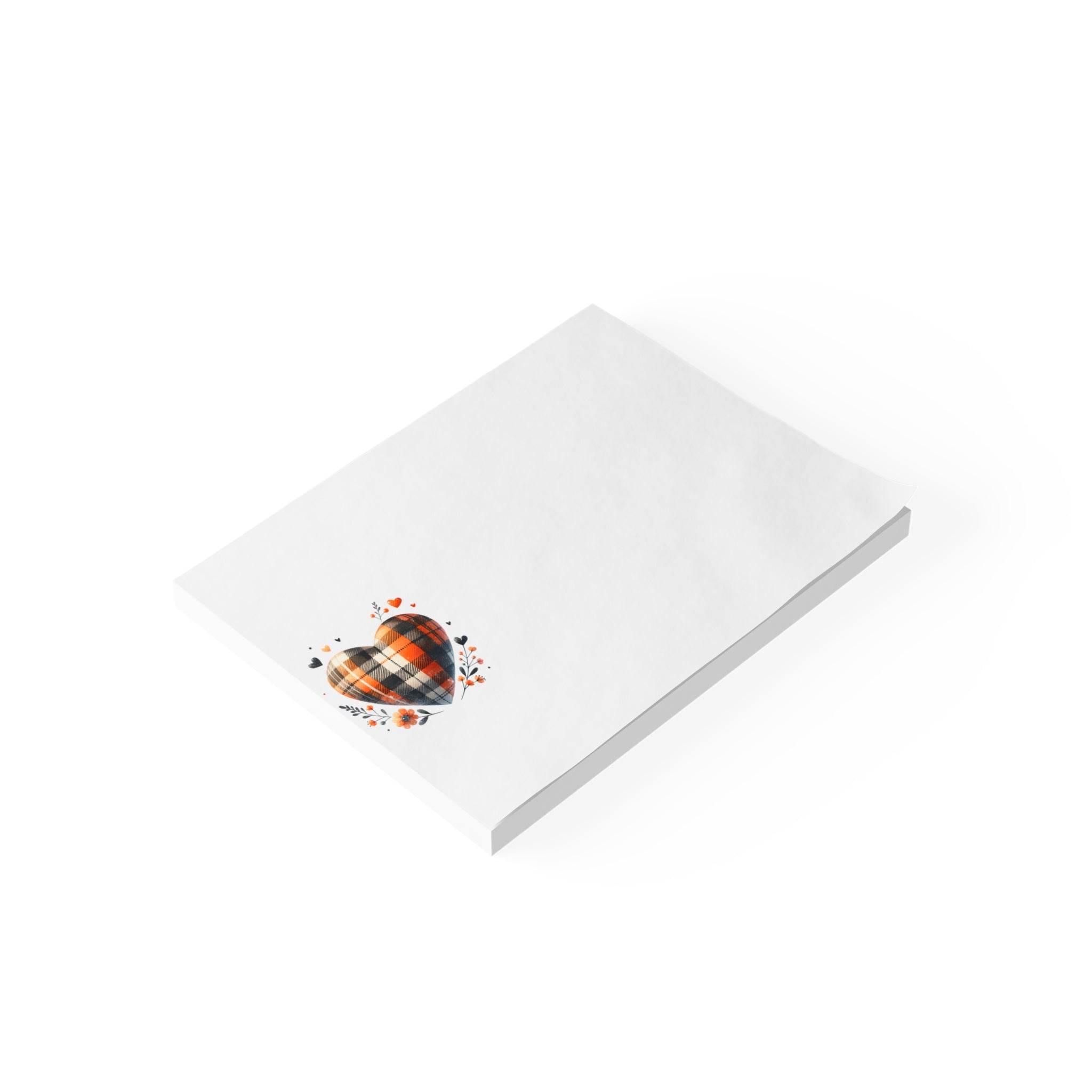 Printify eco-friendly note pads with white pages and a colorful plaid heart design on the cover