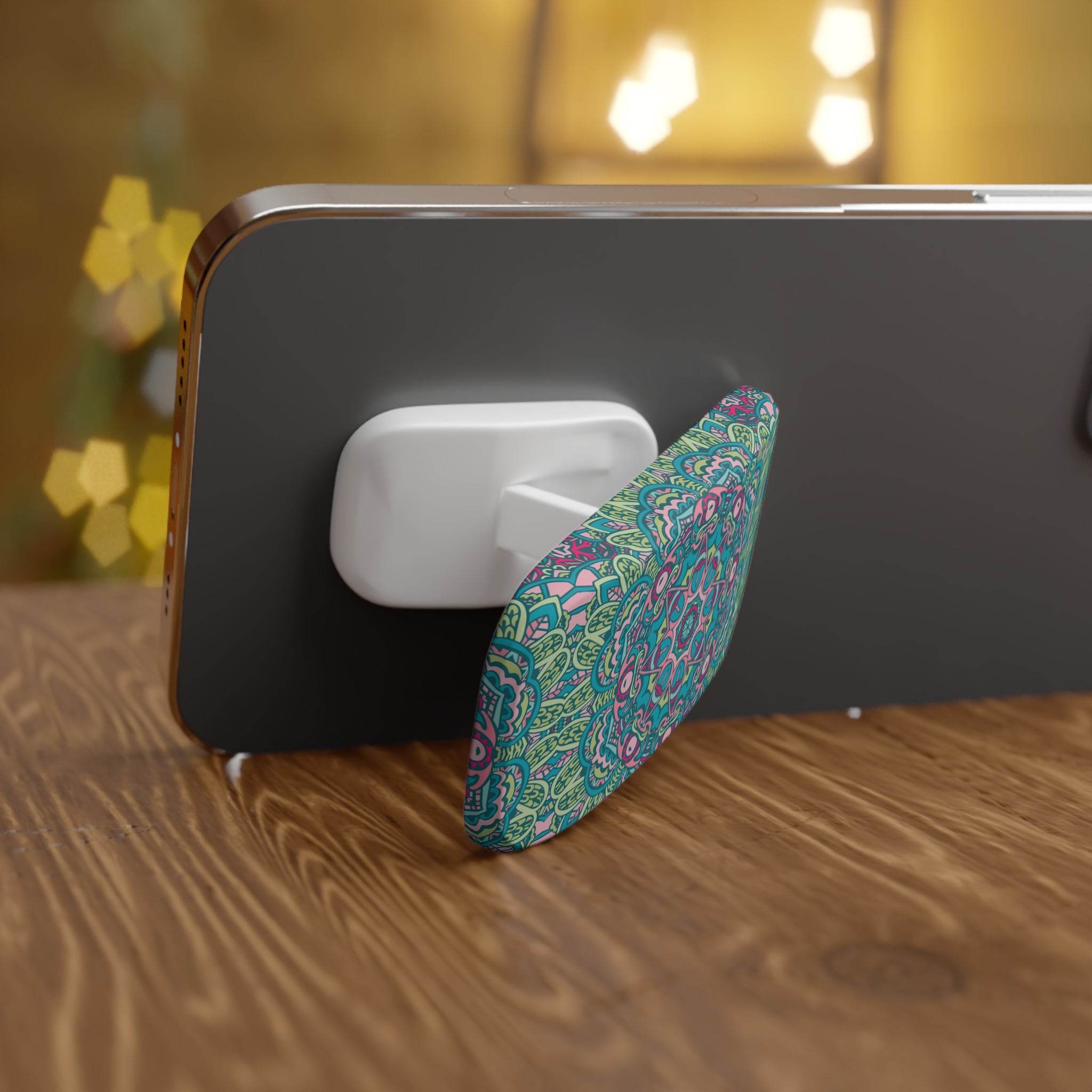 Printify eco-friendly phone grip with colorful mandala design attached to a black smartphone