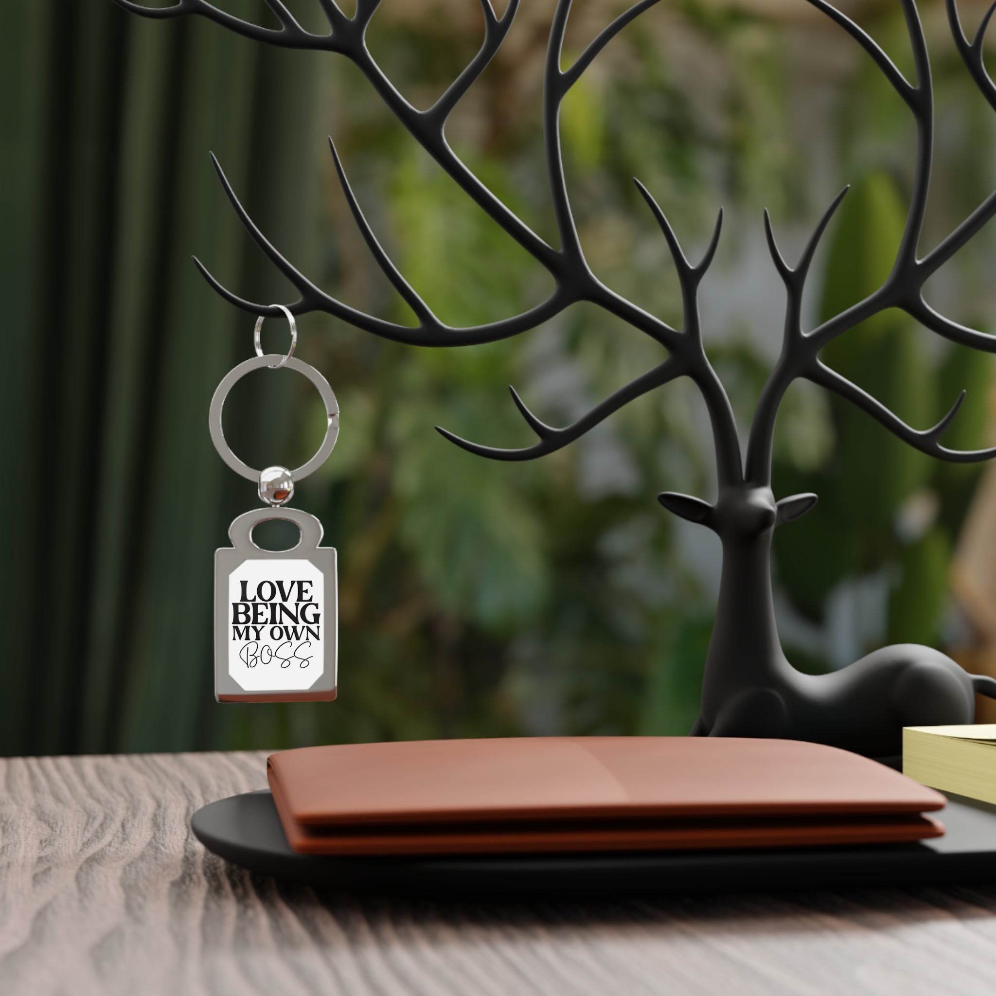Eco-friendly photo keyring with love being my own boss design hanging on black deer-shaped key holder