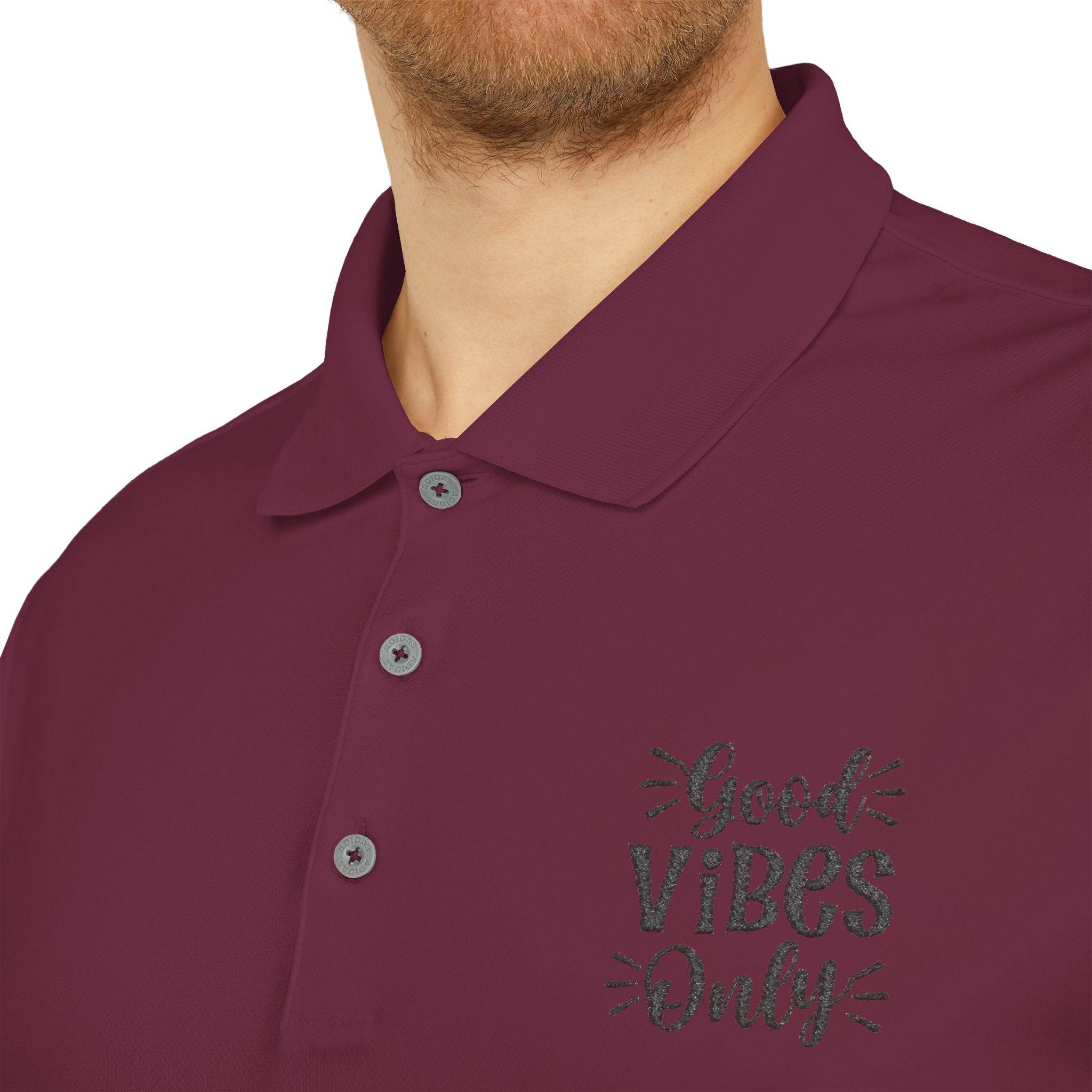 Printify eco-friendly polo shirt in burgundy with Good Vibes Only text design