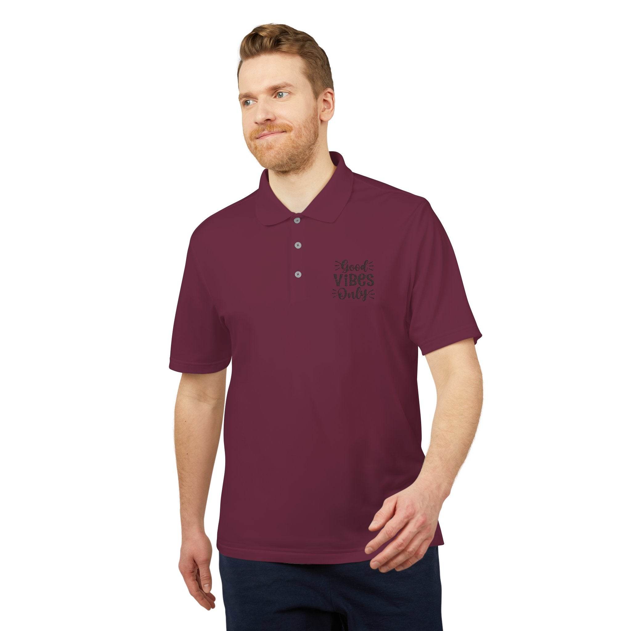 Printify maroon eco-friendly polo shirt worn by man with positive vibes graphic on chest