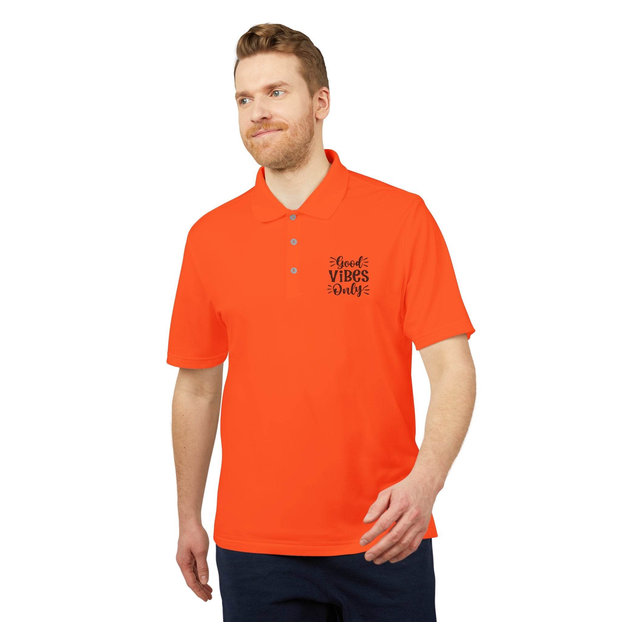 Printify eco-friendly polo shirt in bright orange with Good Vibes Only design on chest