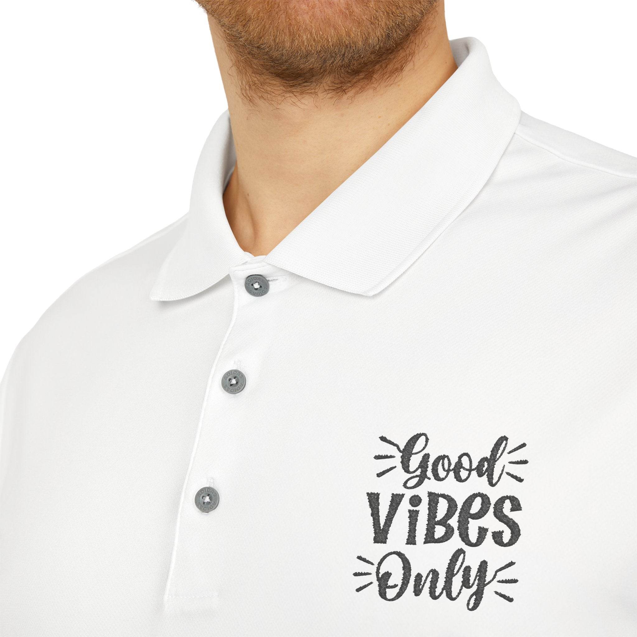 White eco-friendly polo shirt by Printify with Good Vibes Only graphic and button collar