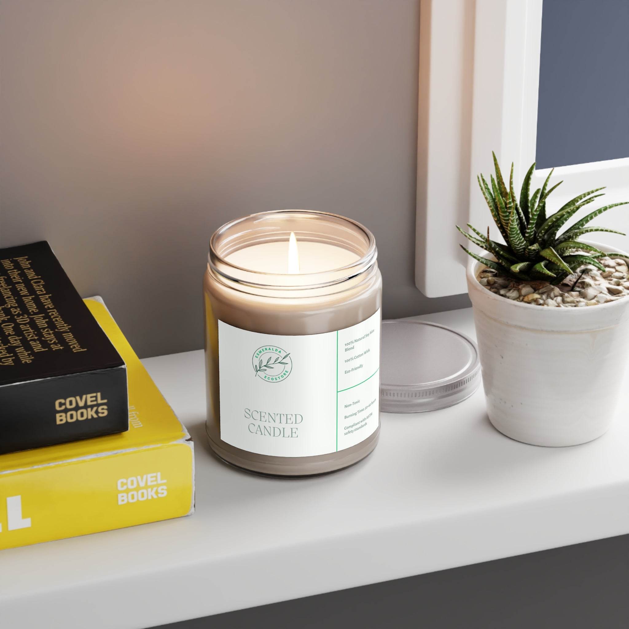 Printify eco-friendly scented candles in glass jar on white windowsill next to books and small potted plant