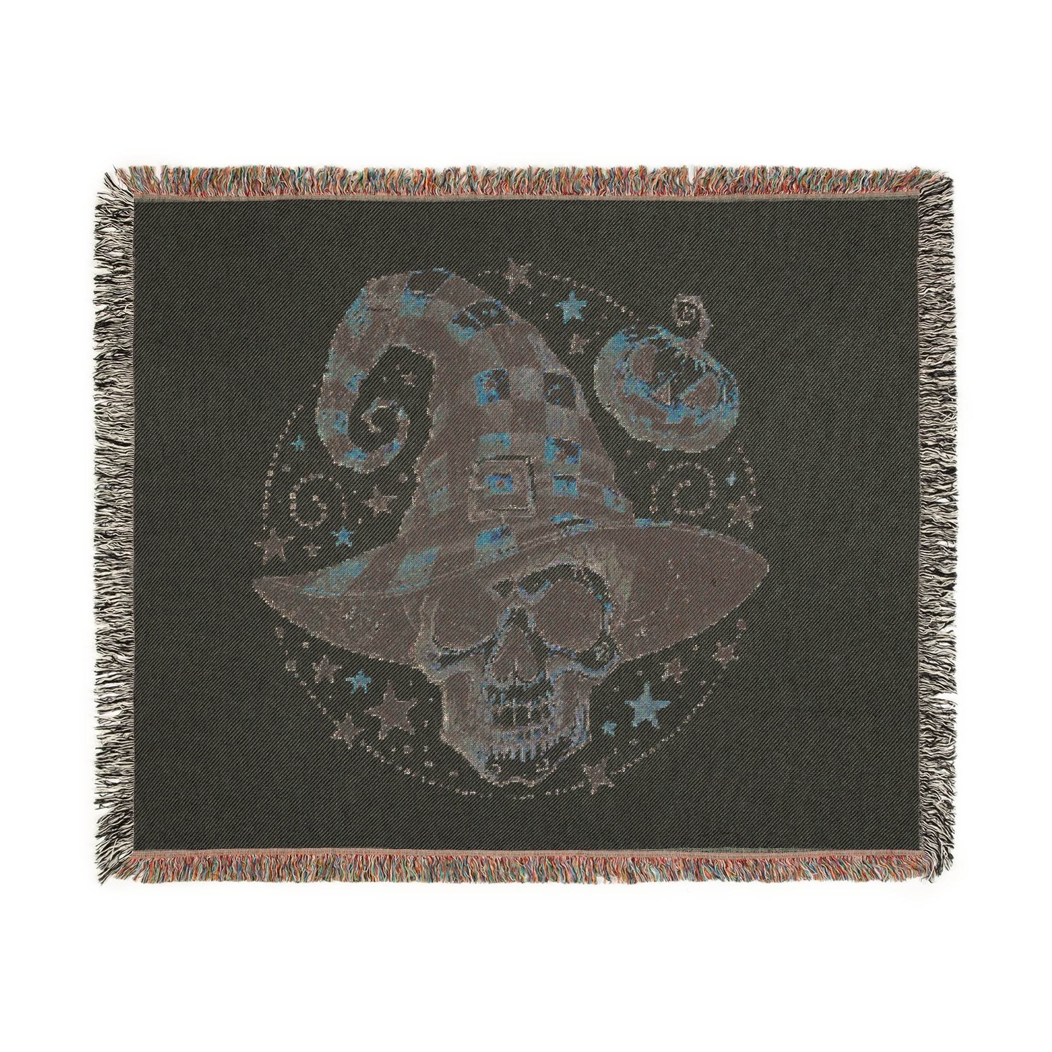 Printify eco-friendly skull blanket with a spooky skull wearing a checkered witch hat and pumpkin design