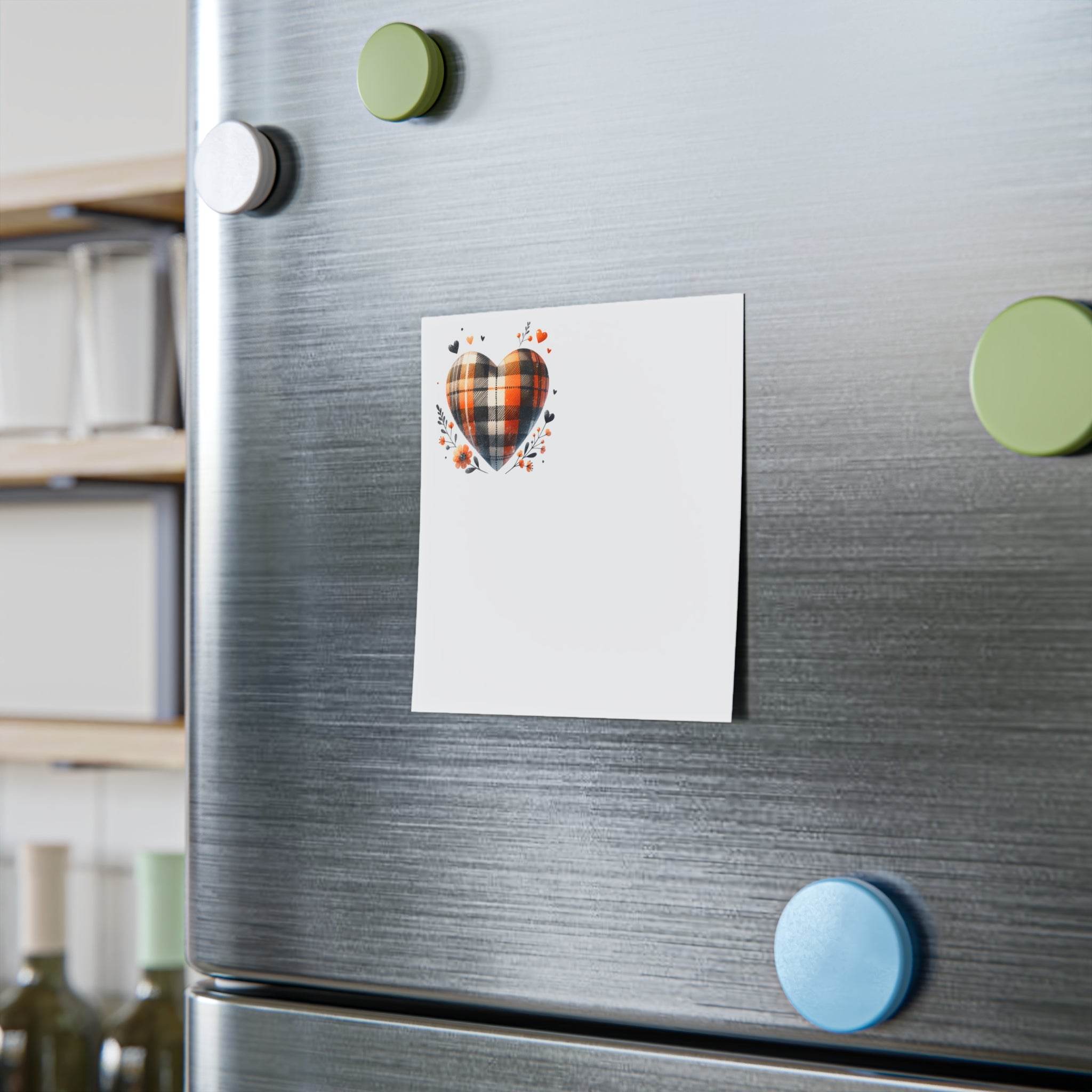 Eco-friendly sticky notes with a plaid heart design on stainless steel refrigerator door with colorful magnets