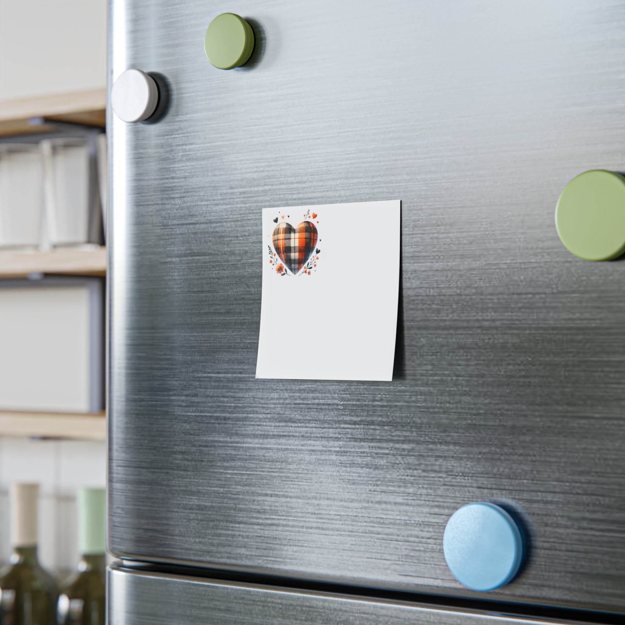 Eco-friendly sticky notes with heart design attached to stainless steel refrigerator using magnets