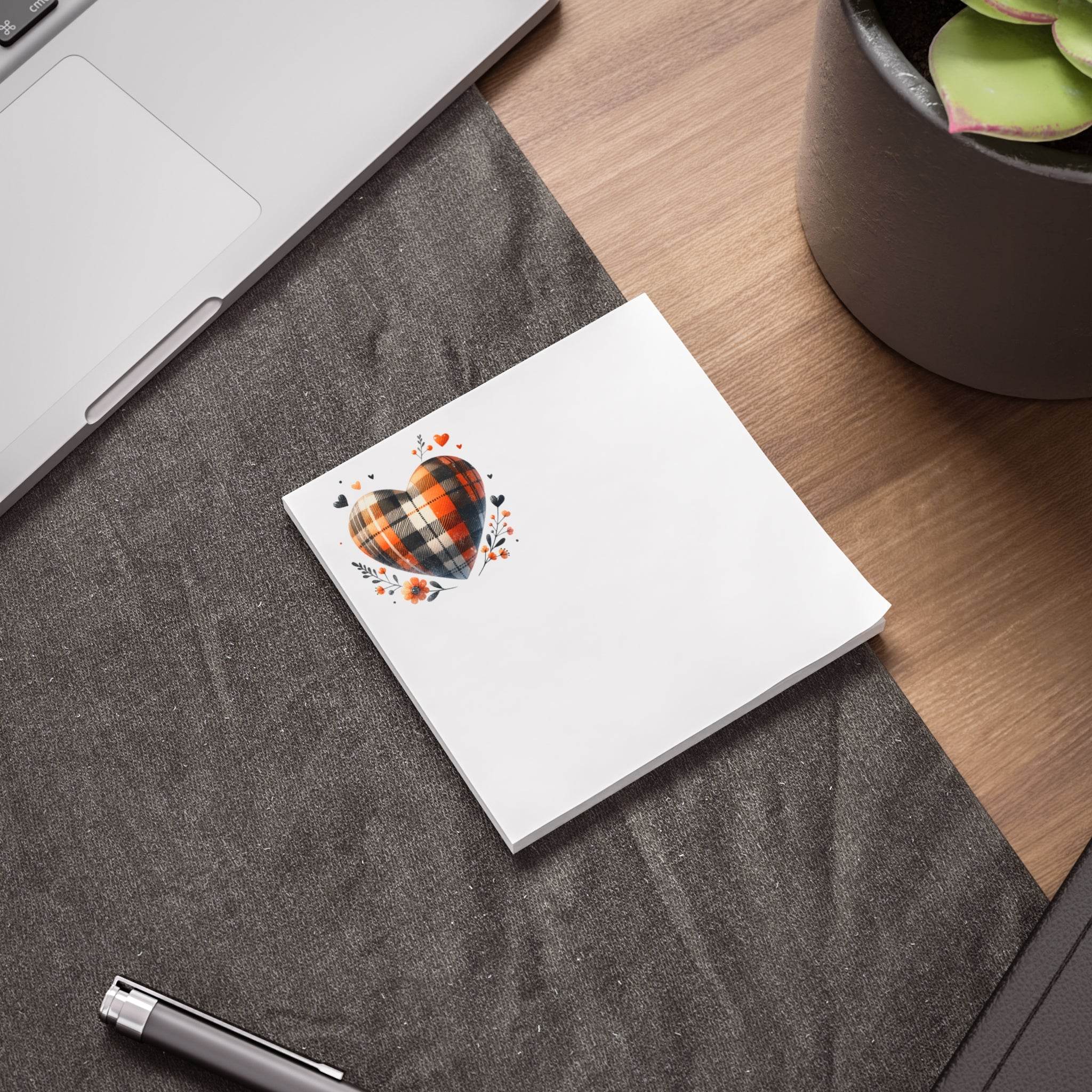 Printify eco-friendly sticky notes with plaid heart design on a desk next to laptop and pen