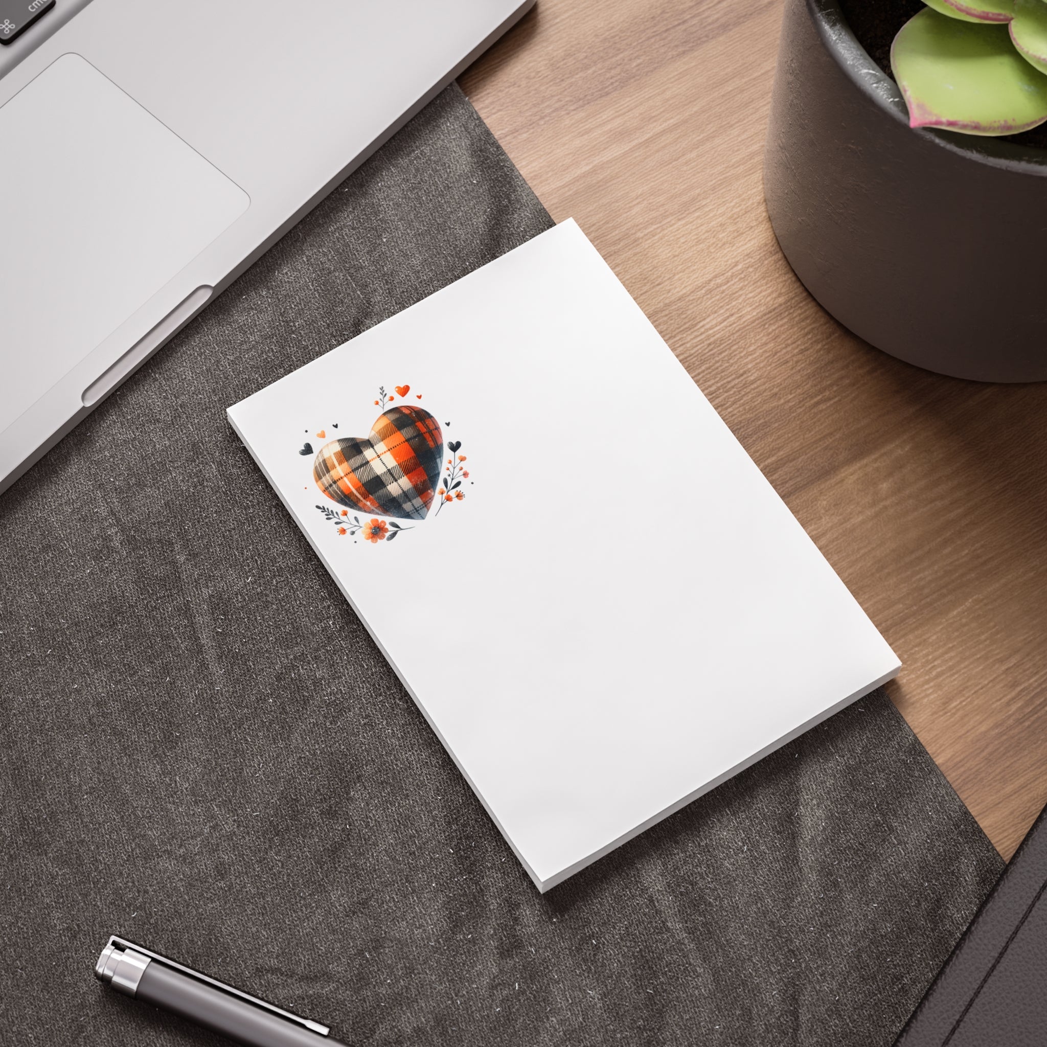 Printify eco-friendly sticky notes with plaid heart design on white paper placed on desk near laptop and plant
