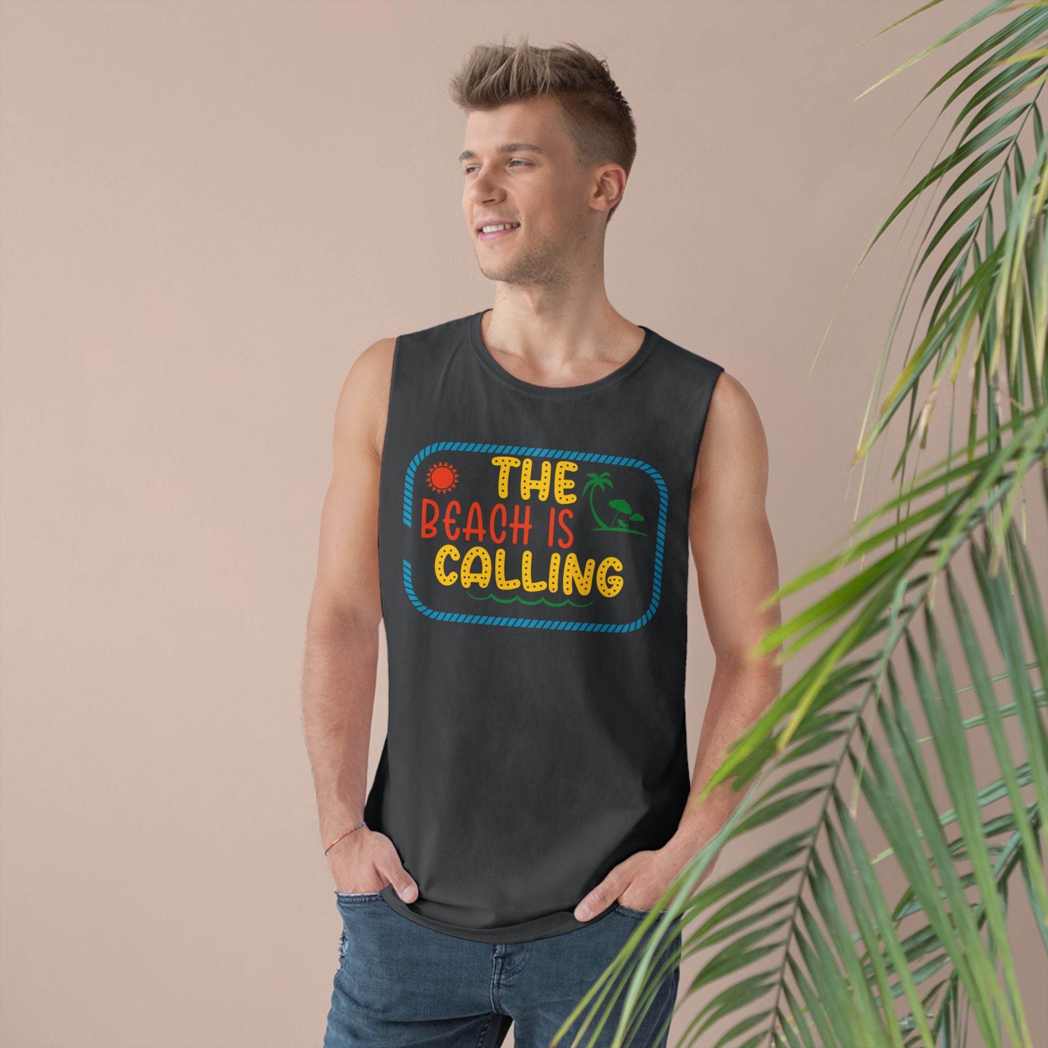 Man wearing Printify eco-friendly tank top with colorful The Beach is Calling graphic design