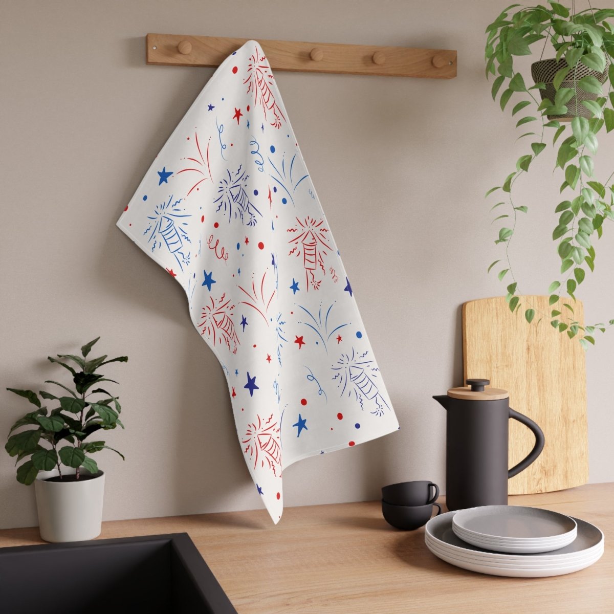 Colorful Printify eco-friendly tea towels hanging in a modern kitchen setting