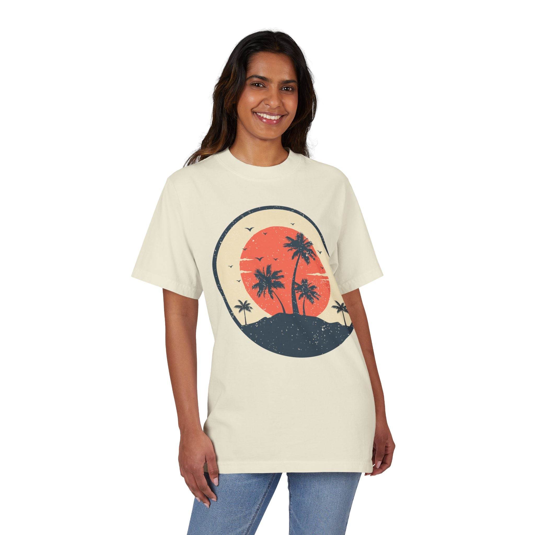 Printify eco-friendly unisex graphic tee in cream with palm tree sunset design worn by smiling woman