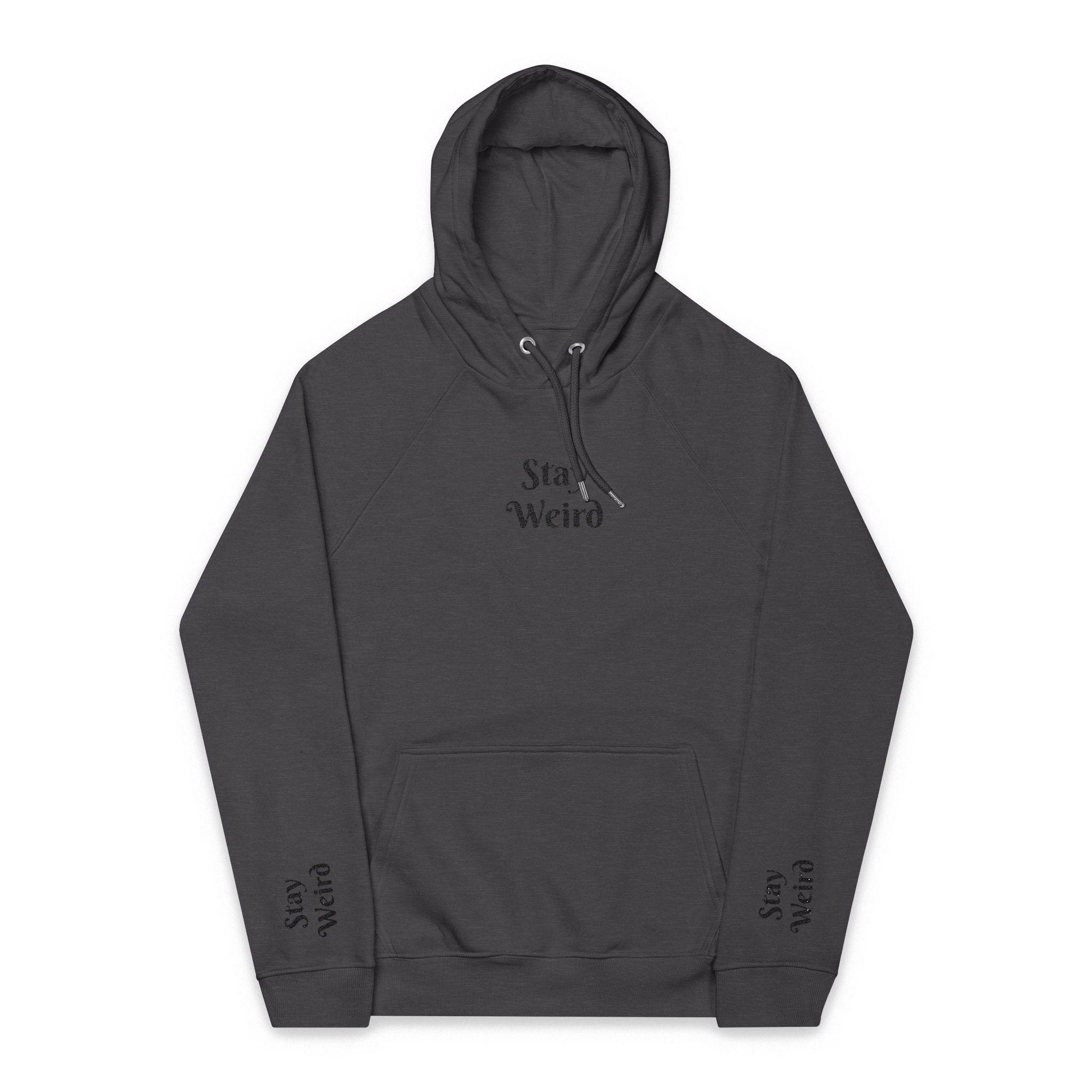 Printify eco friendly unisex hoodie in dark gray with Stay Weird text on chest and sleeves