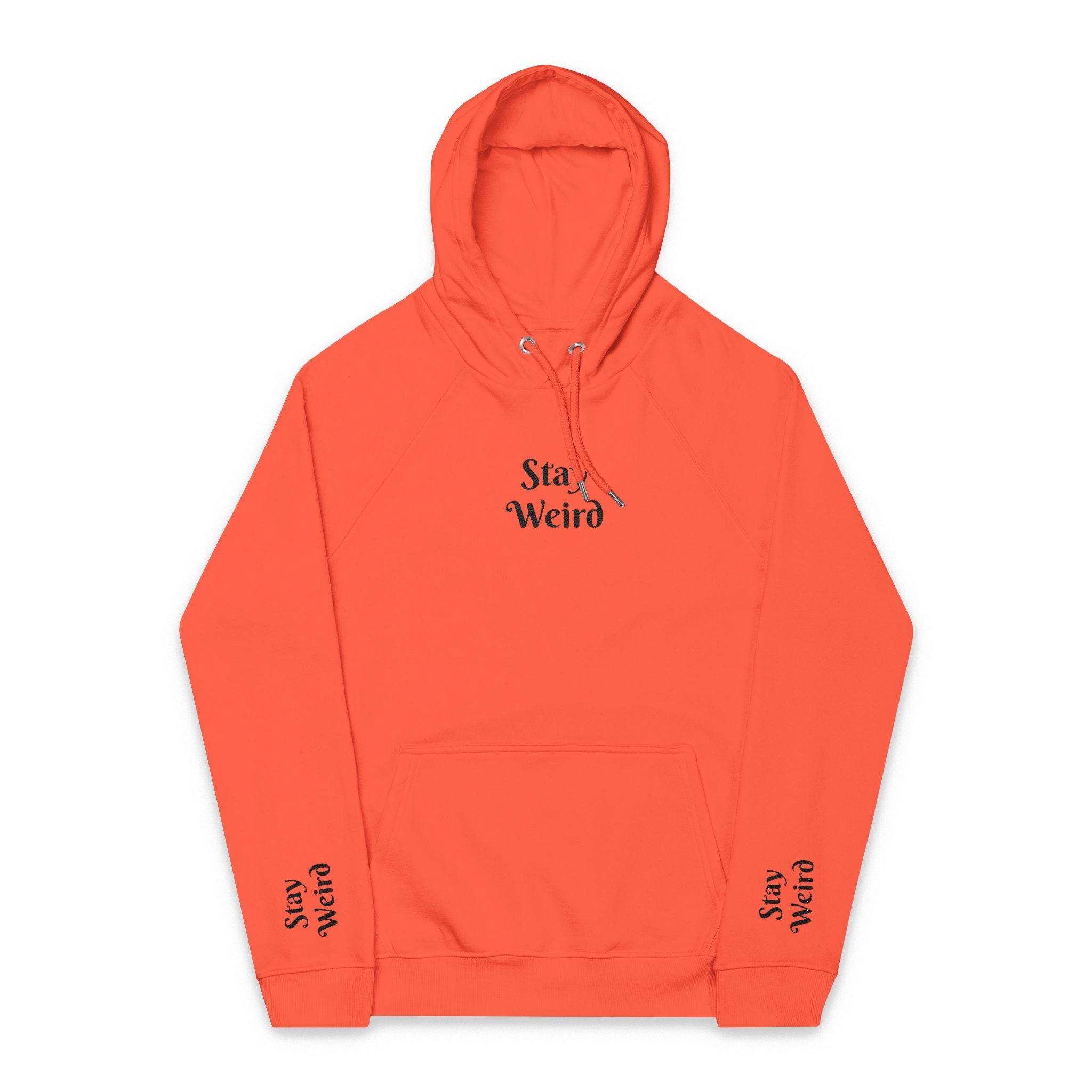 Printify eco friendly unisex hoodie in coral with Stay Weird text on chest and sleeves