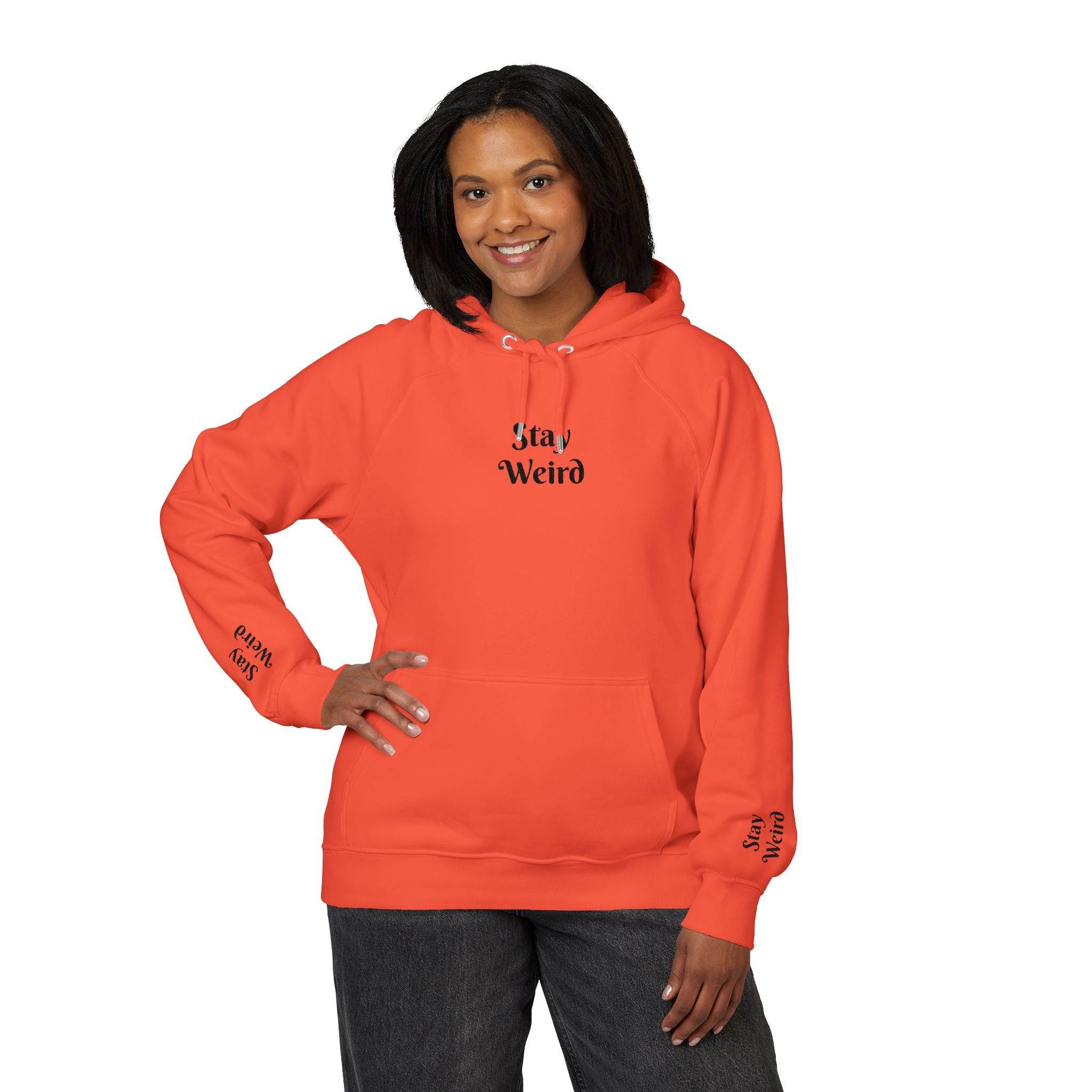 Printify eco friendly unisex hoodie in bright orange with Stay Weird text and a front pocket