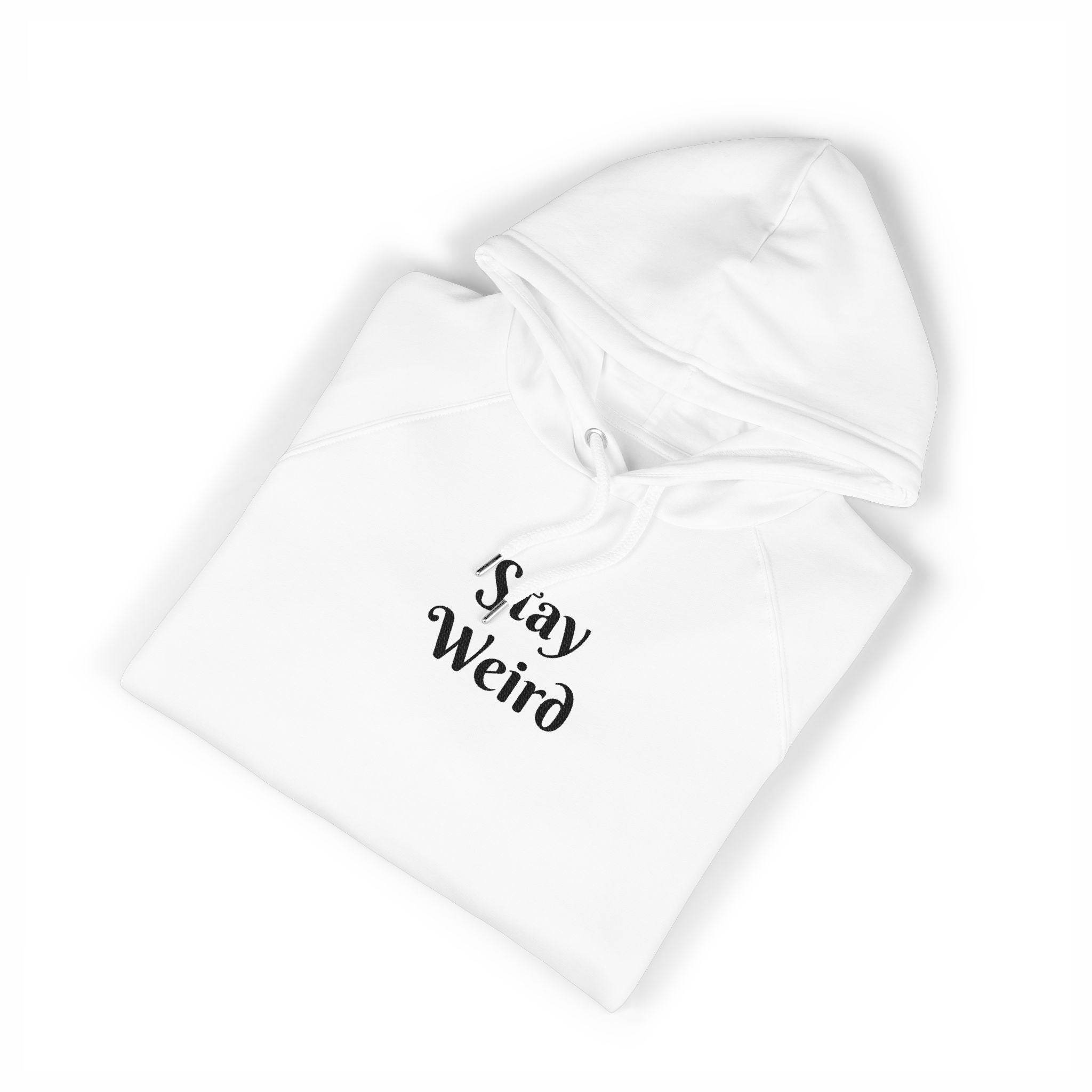 White eco friendly unisex hoodie by Printify with Stay Weird text printed on the front