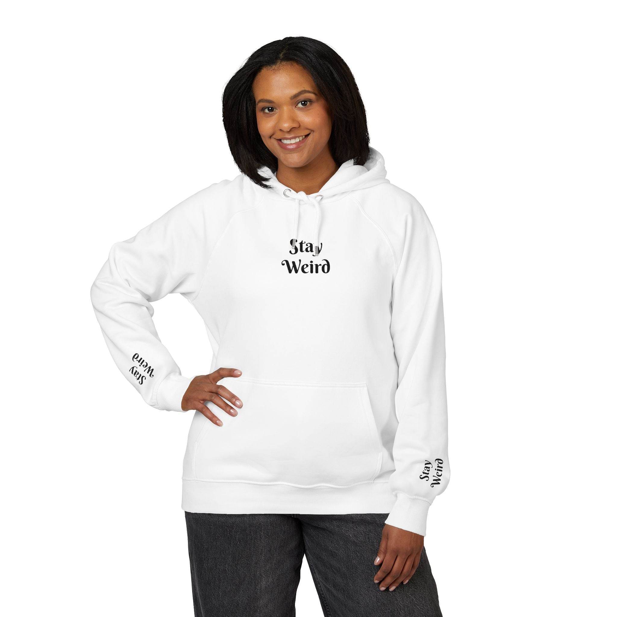 Printify white eco friendly unisex hoodie with Stay Weird text worn by smiling woman