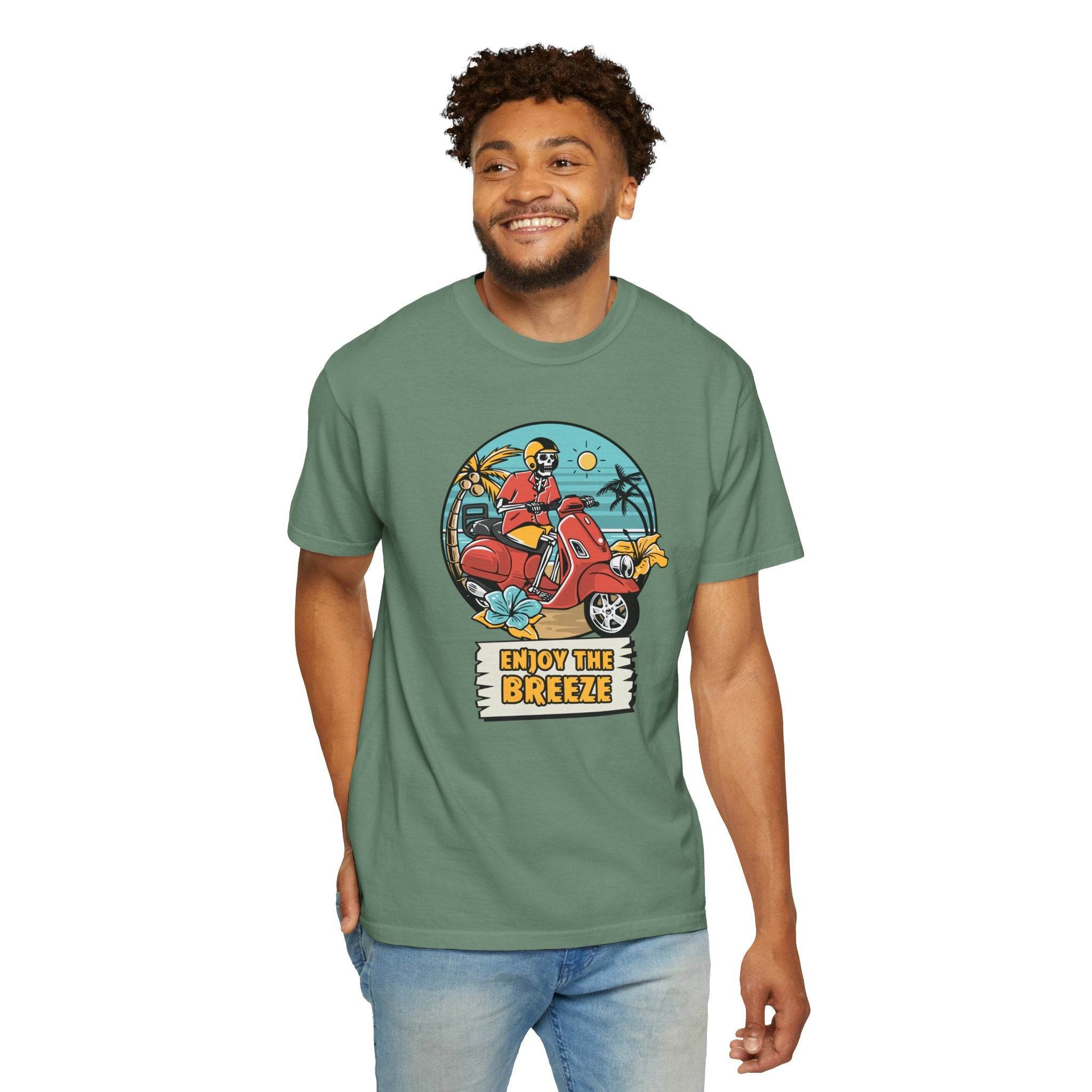 Printify eco-friendly unisex t-shirt in green with colorful Enjoy the Breeze graphic design