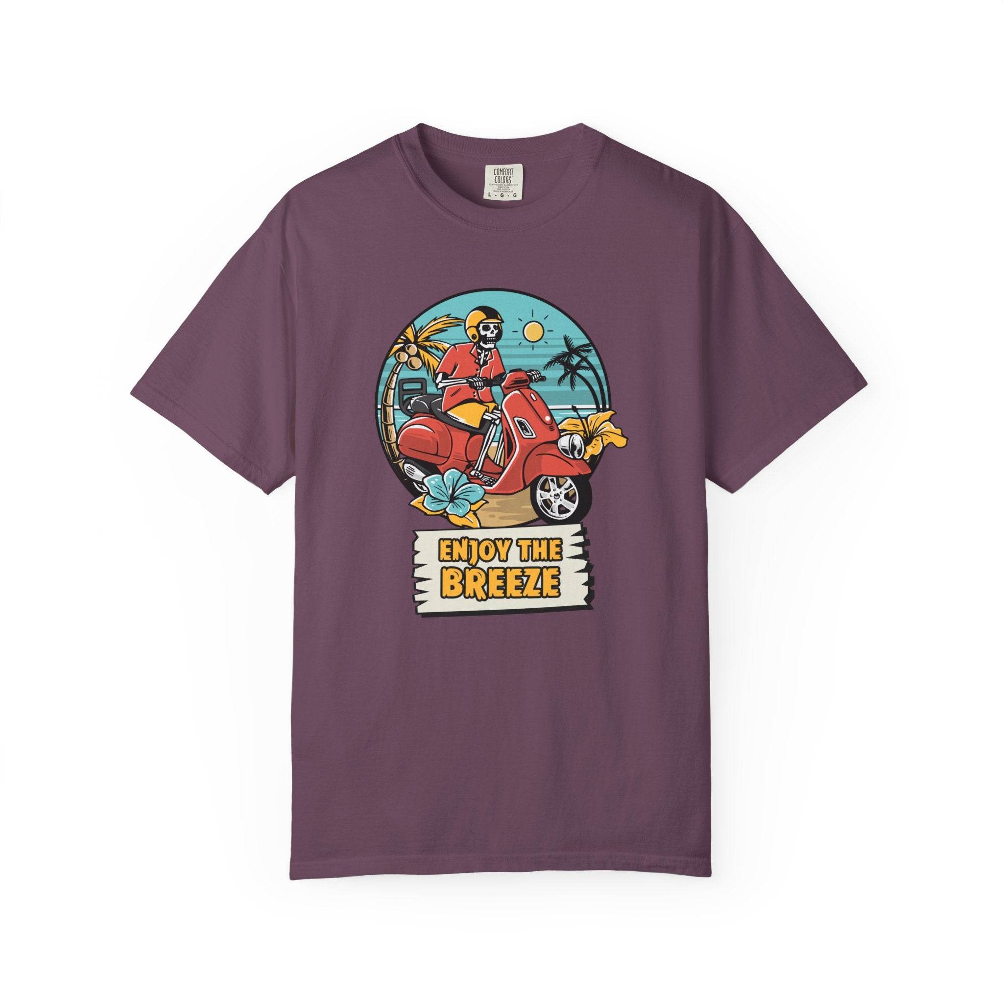 Printify eco-friendly unisex t-shirt in purple with a skeleton riding a red scooter and enjoy the breeze design