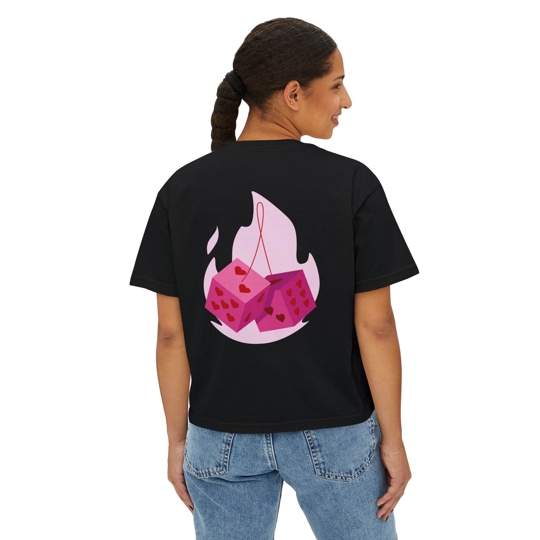 Printify eco-friendly women boxy tee in black with pink dice graphic on back worn by woman