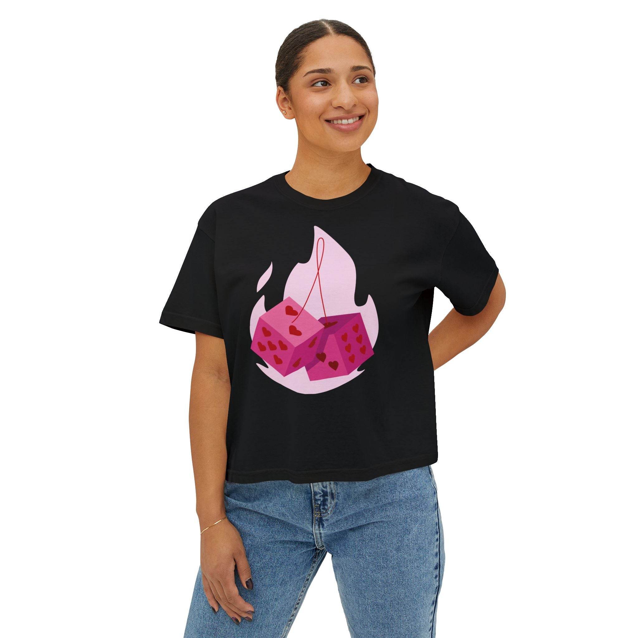 Eco-friendly women boxy tee black with pink dice flame graphic worn with jeans