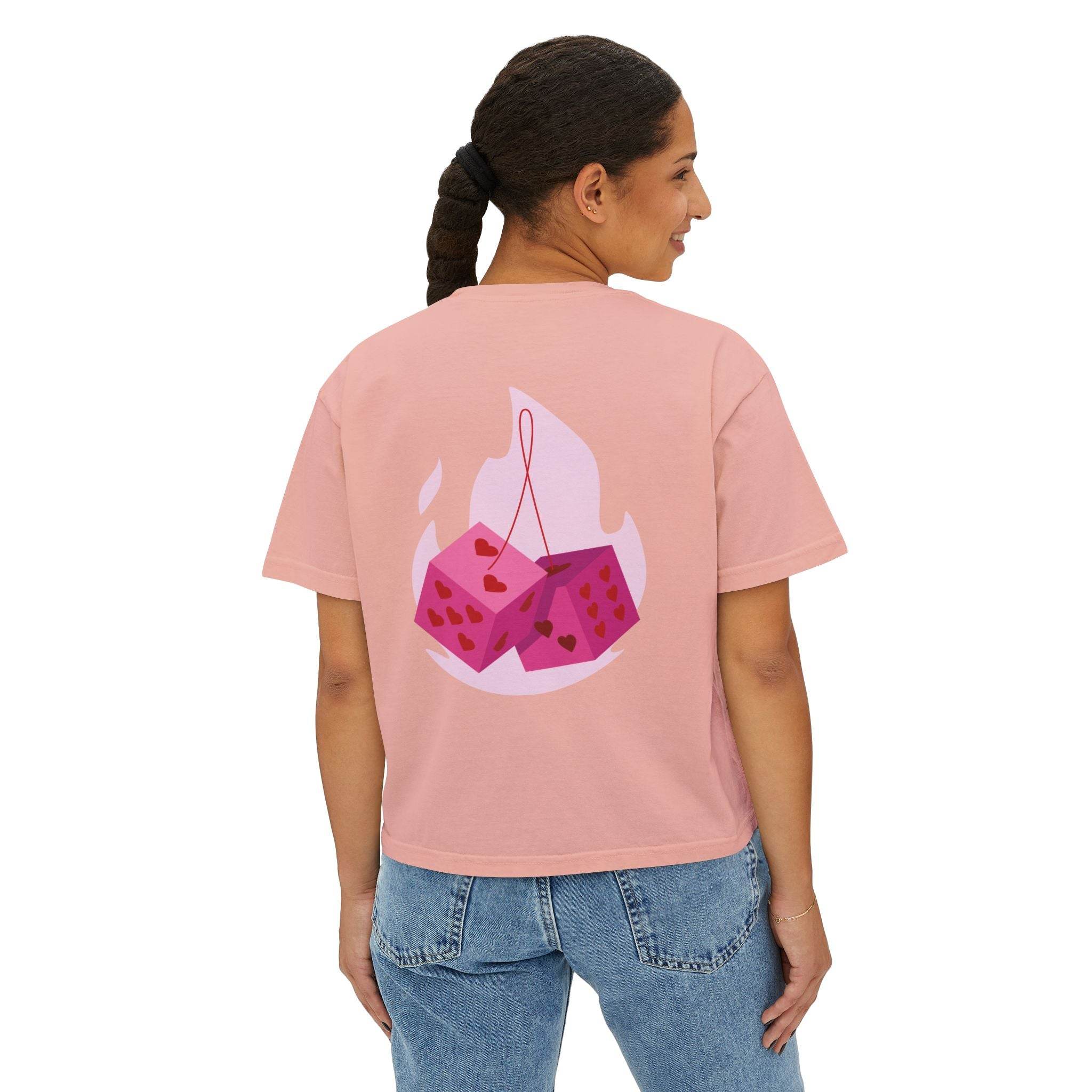 Printify eco-friendly women boxy tee in pink with graphic dice design worn by woman
