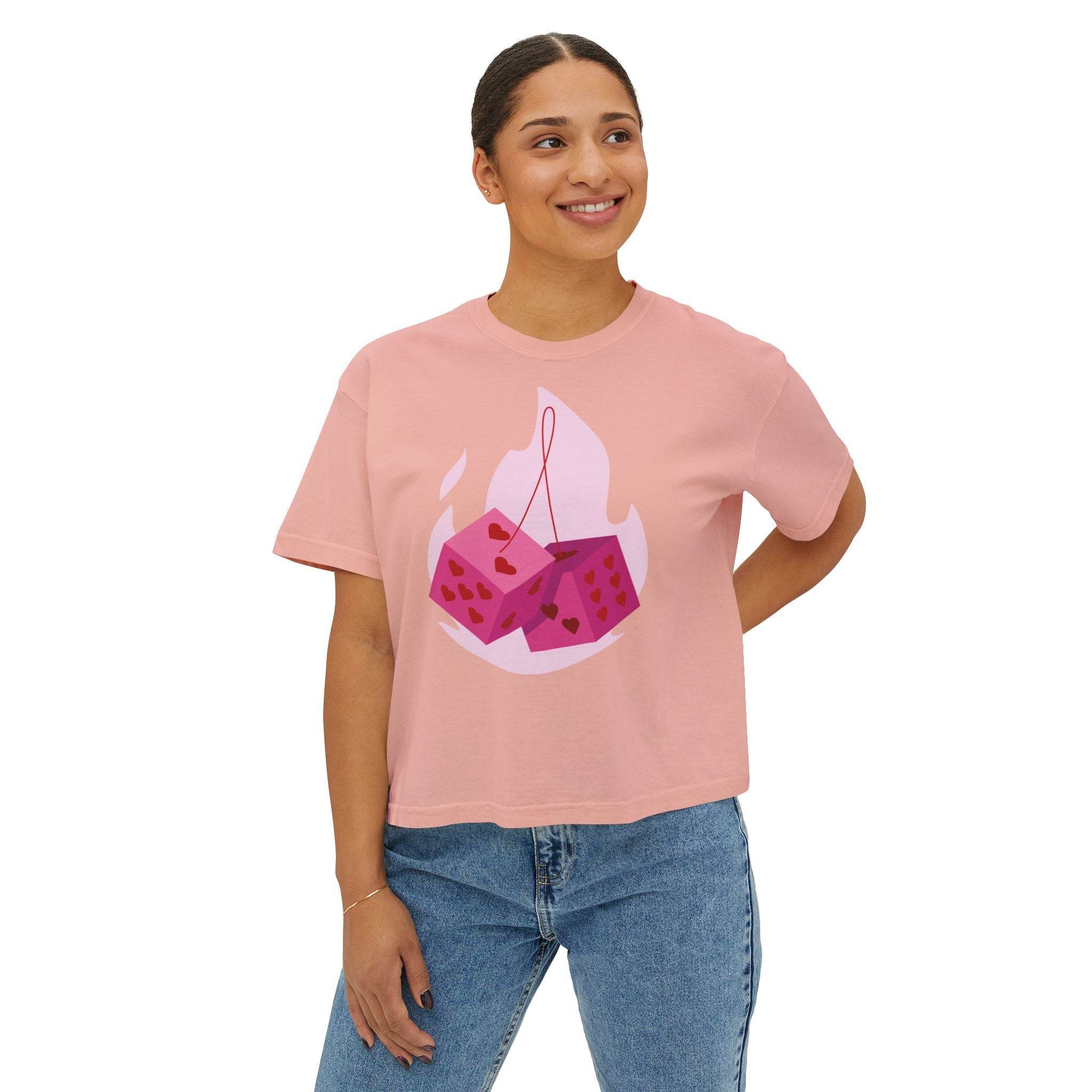 Printify eco-friendly women boxy tee in pink with graphic dice design worn with blue jeans