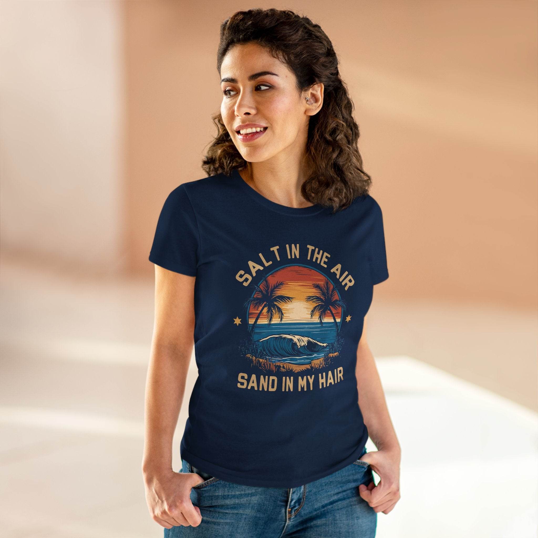 Eco-friendly women's cotton tee by Printify in navy with beach sunset graphic and text Salt in the Air Sand in My Hair