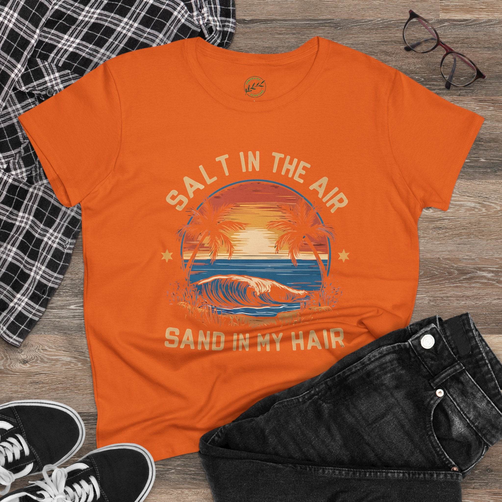Orange eco-friendly women's cotton tee with salt in the air sand in my hair beach design