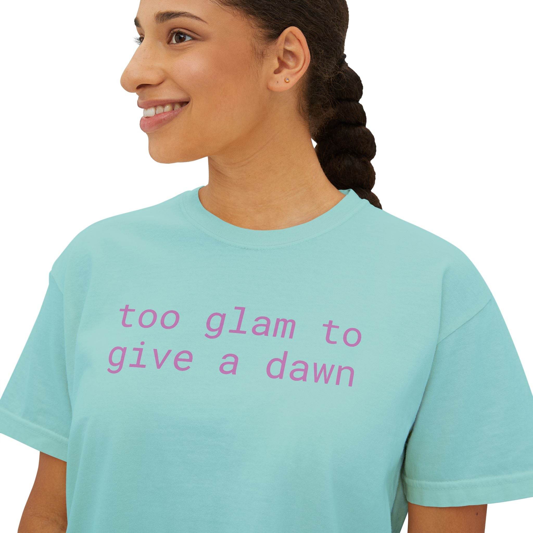 Printify eco-friendly women's graphic tee in light blue with pink text saying too glam to give a dawn