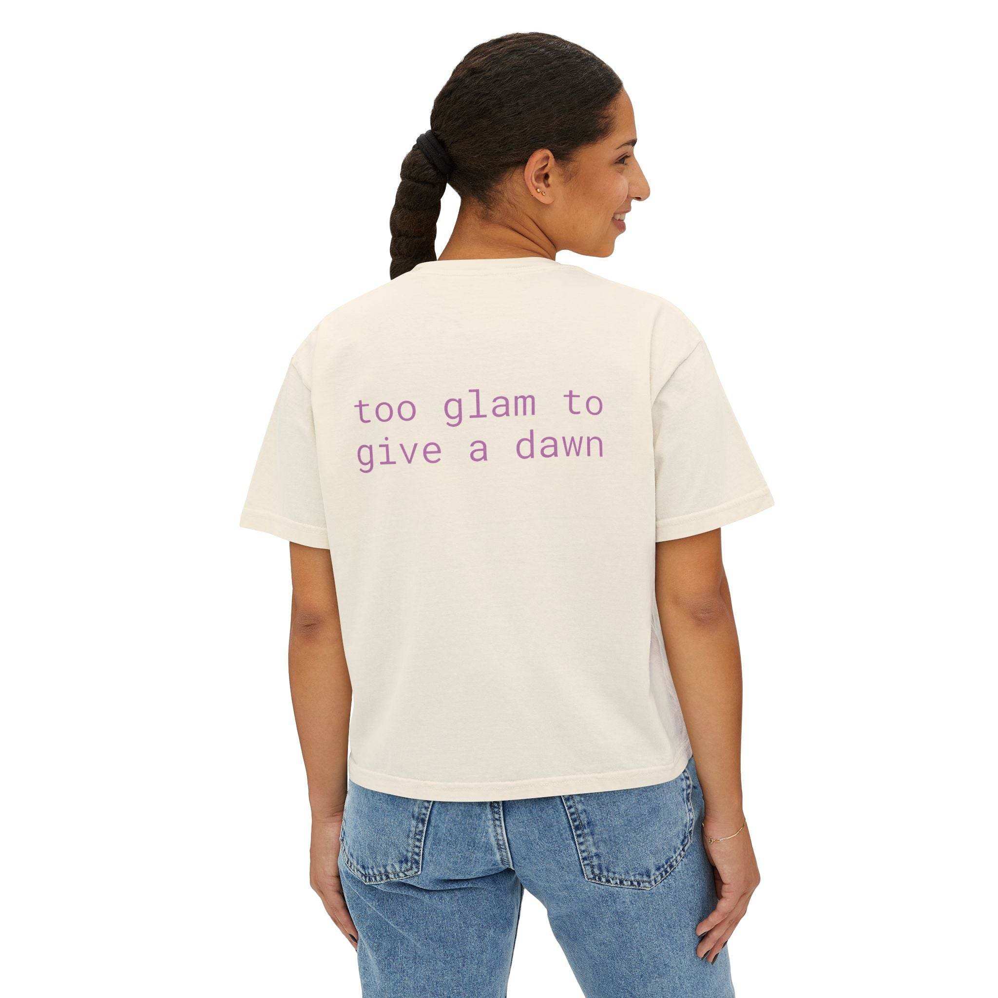 Printify eco-friendly women's graphic tee in cream with purple text saying too glam to give a dawn