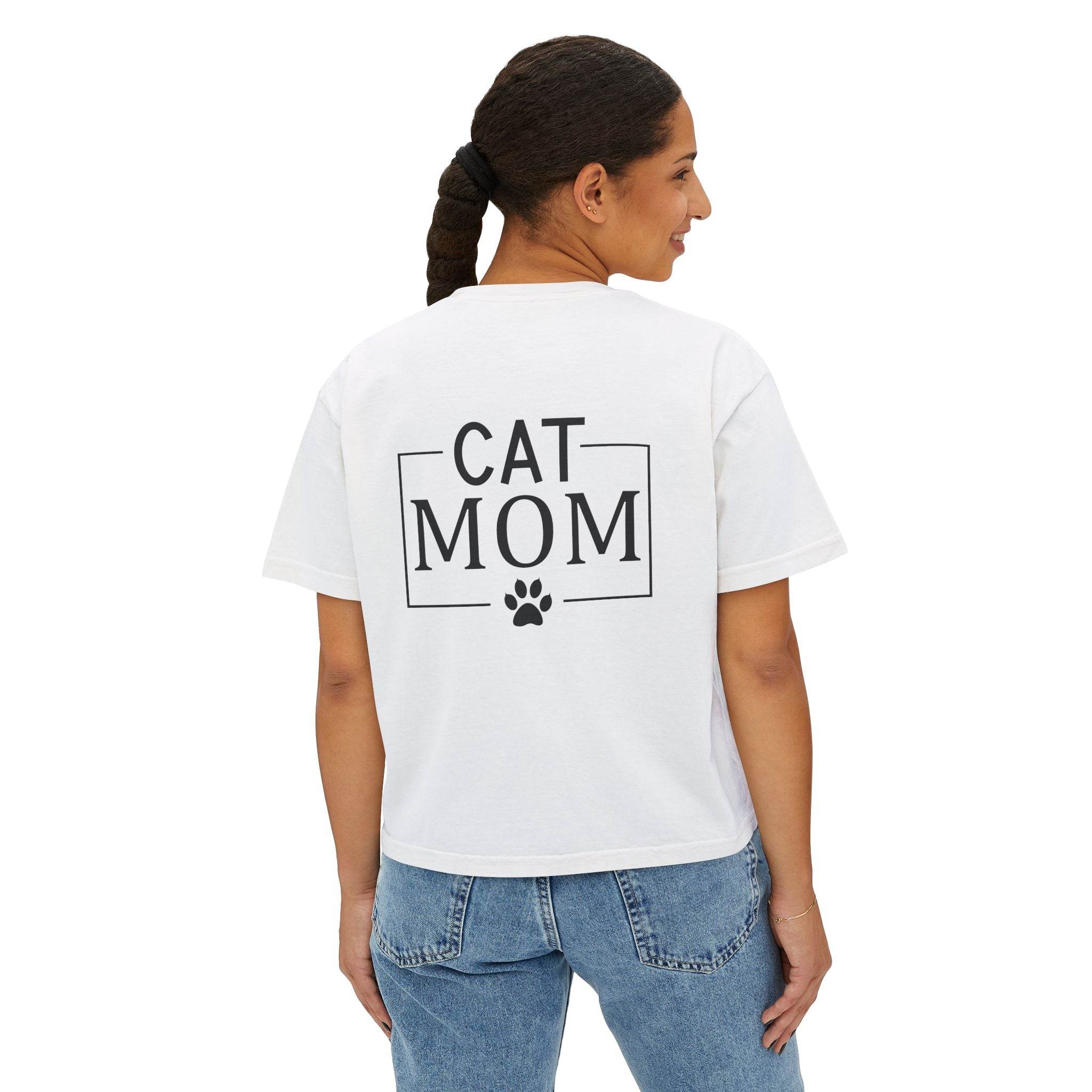Printify eco-friendly cat mom shirt on woman showing back design CAT MOM text and paw print on white tee