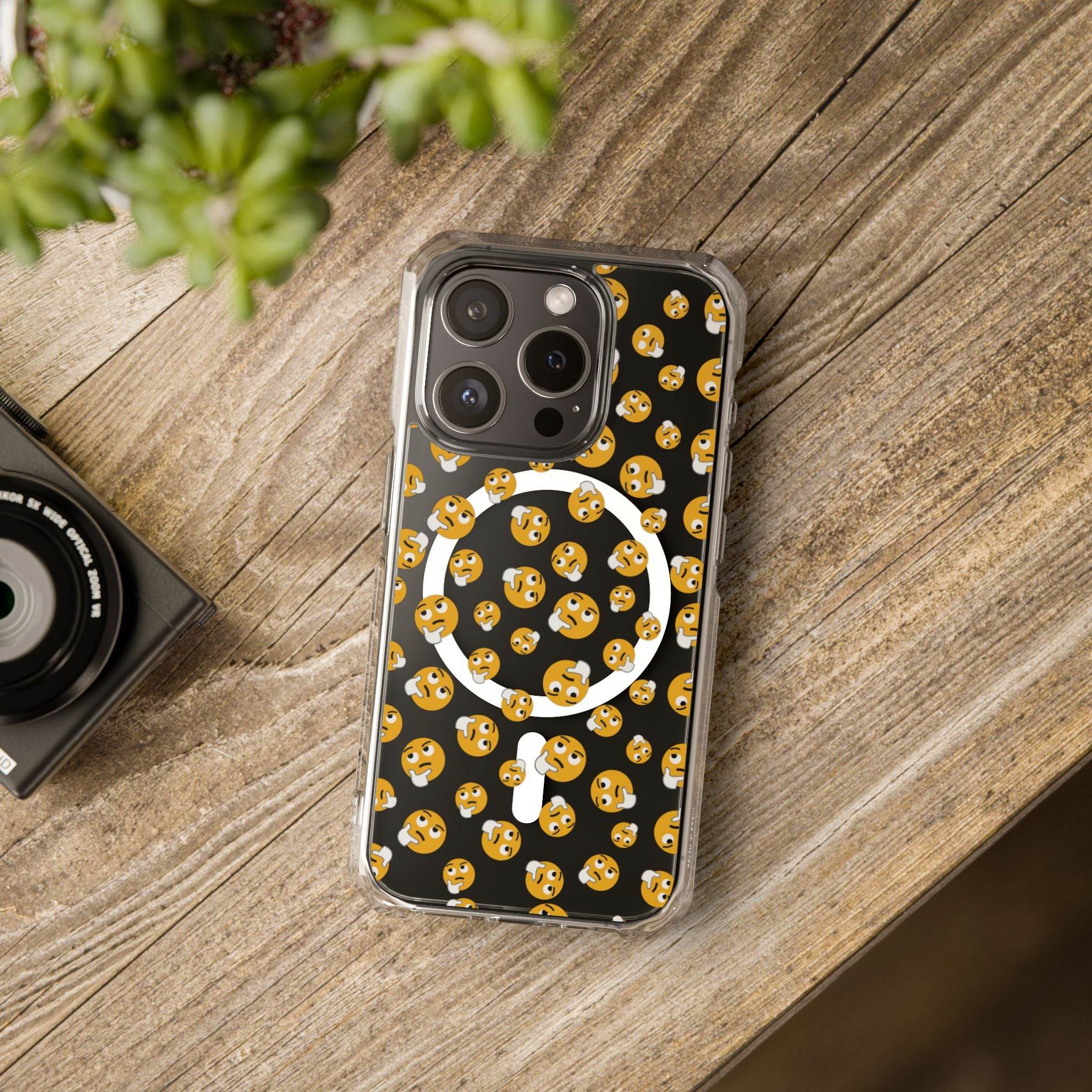 Printify eco-friendly magnetic phone case with emoji and magnifying glass design on wooden surface