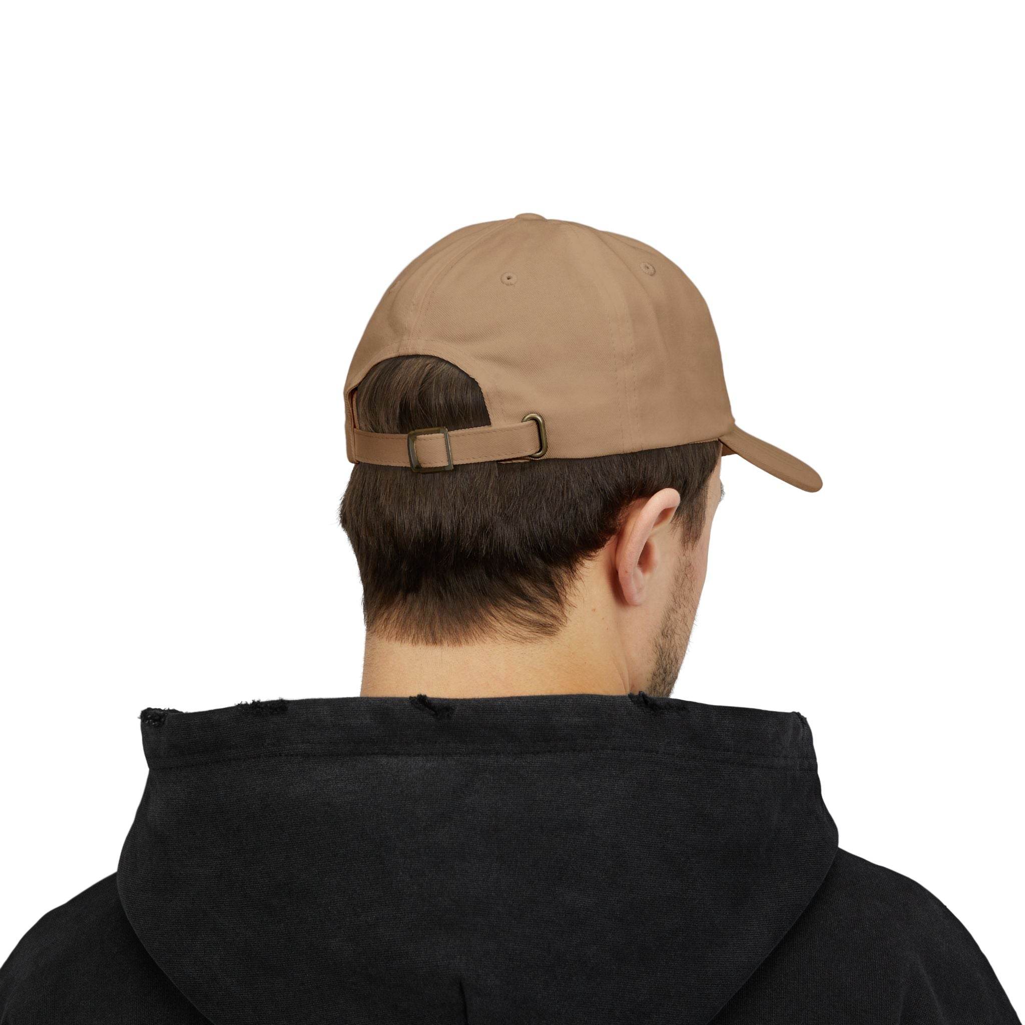 Man wearing a tan eco-friendly dad cap from Printify with adjustable strap shown from the back