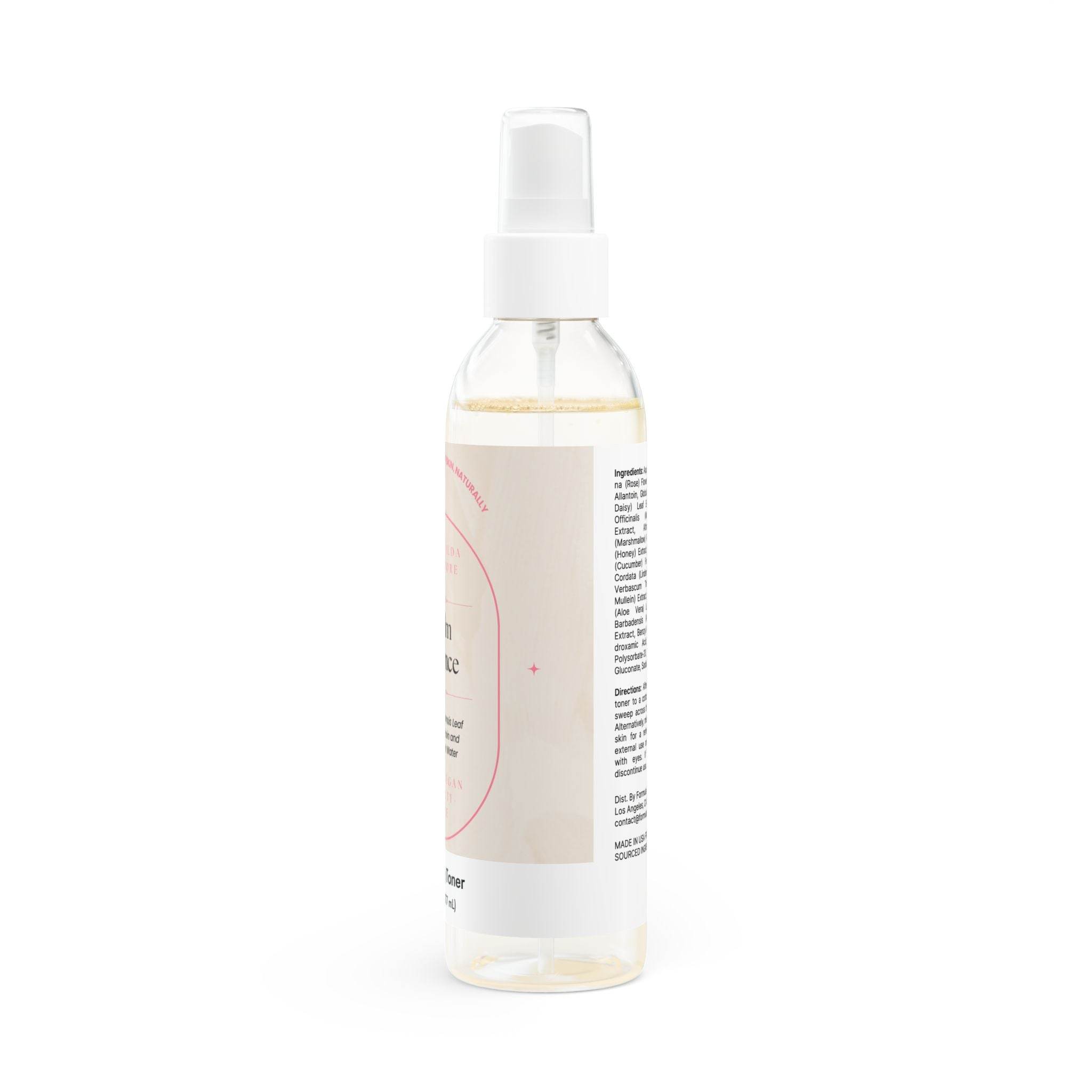 Clear spray bottle of natural face toner for sensitive skin with white cap and label by Printify