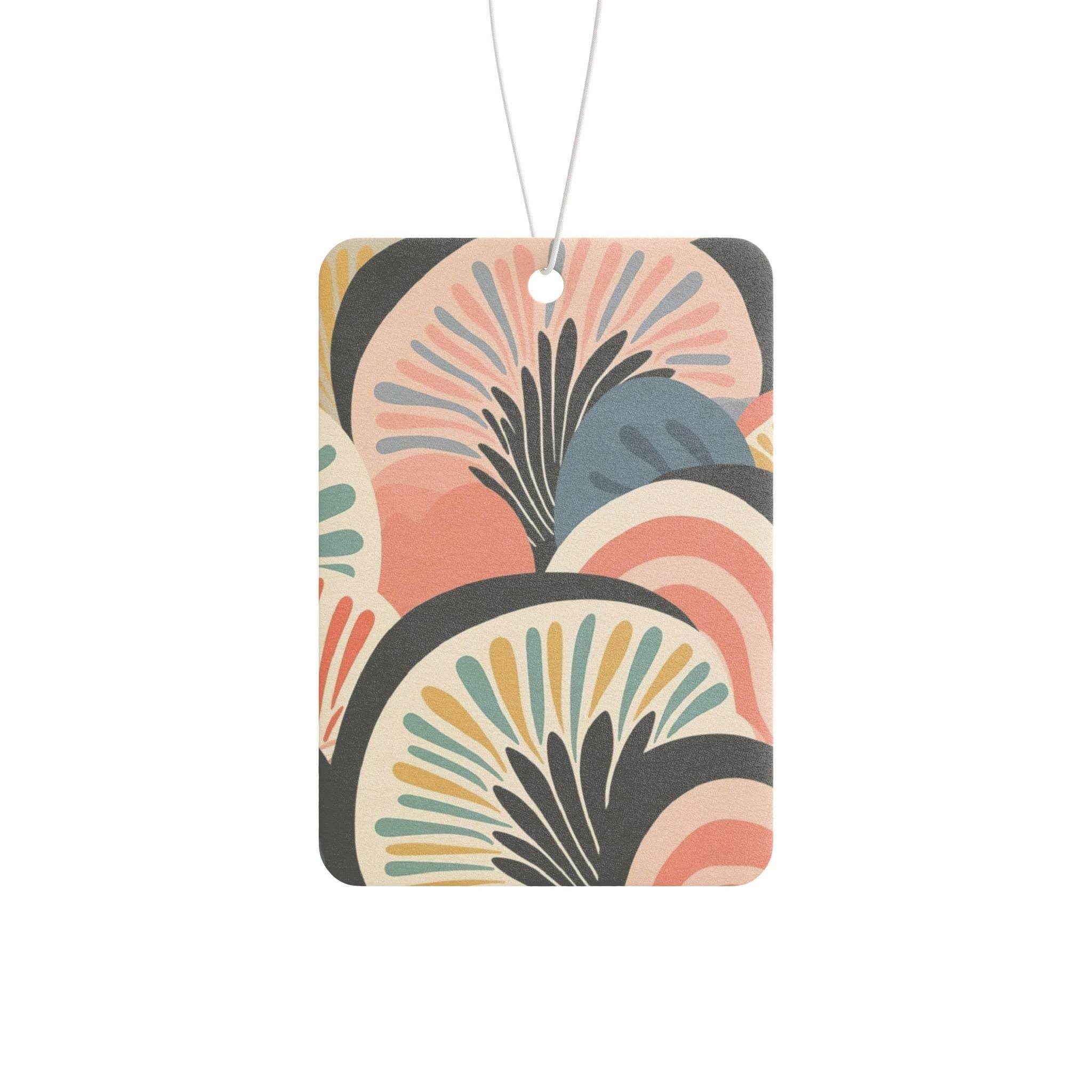 Printify eco-friendly car air fresheners with colorful abstract floral design hanging by a string