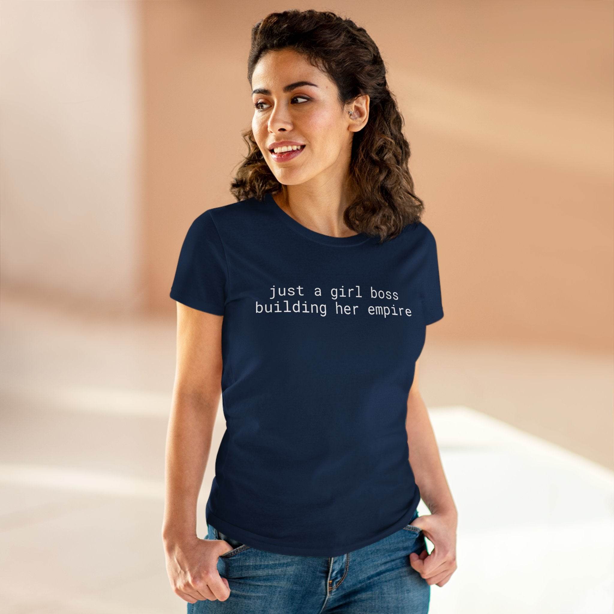 Printify model wearing eco-friendly girl boss shirt navy tee reading just a girl boss building her empire