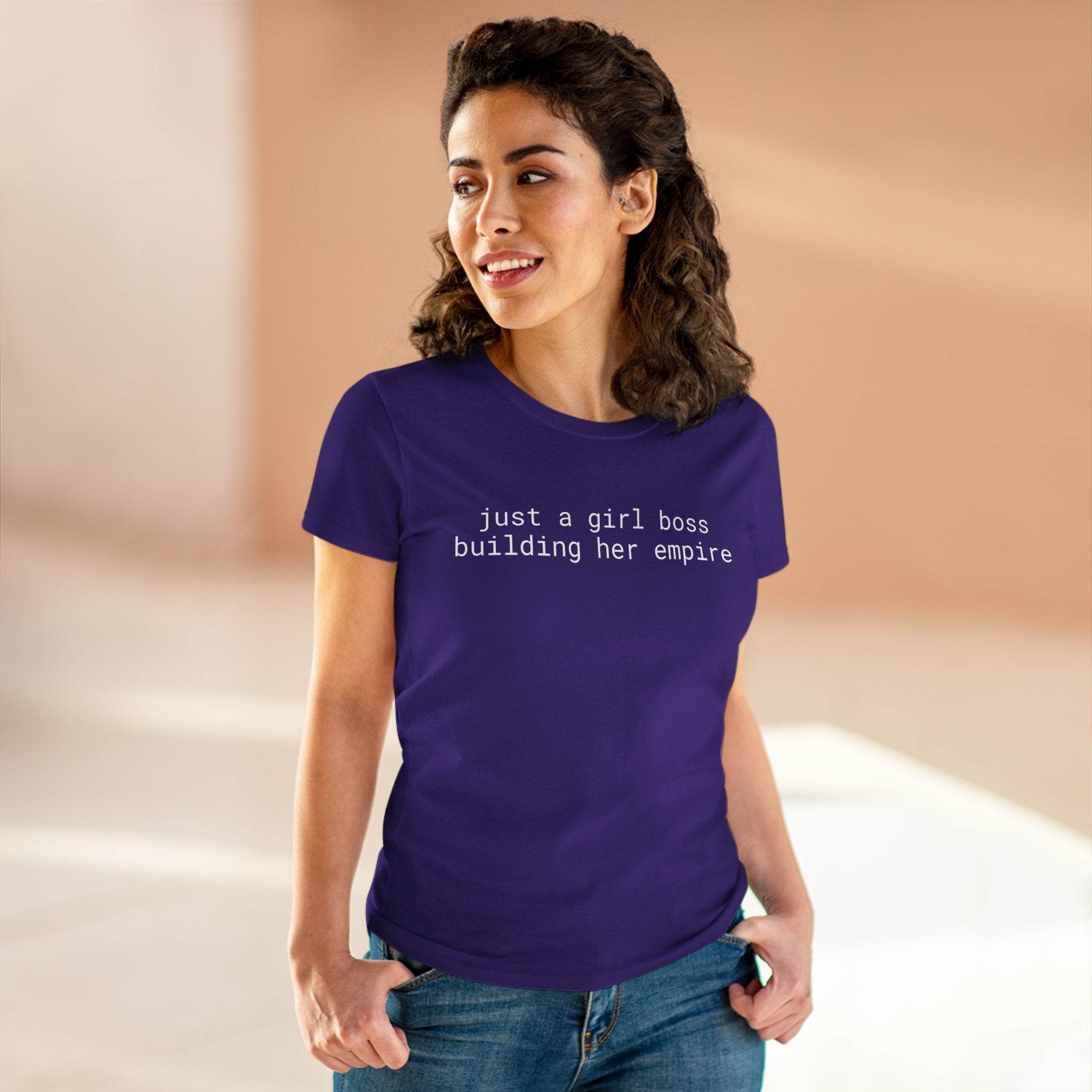 Model wearing purple eco-friendly girl boss shirt with white text just a girl boss building her empire casual tee