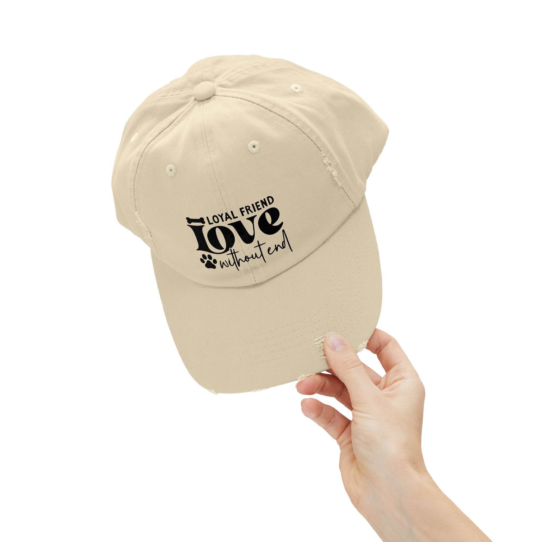 Printify beige distressed baseball cap held by hand featuring paw print design and text, eco-friendly pet lover hat