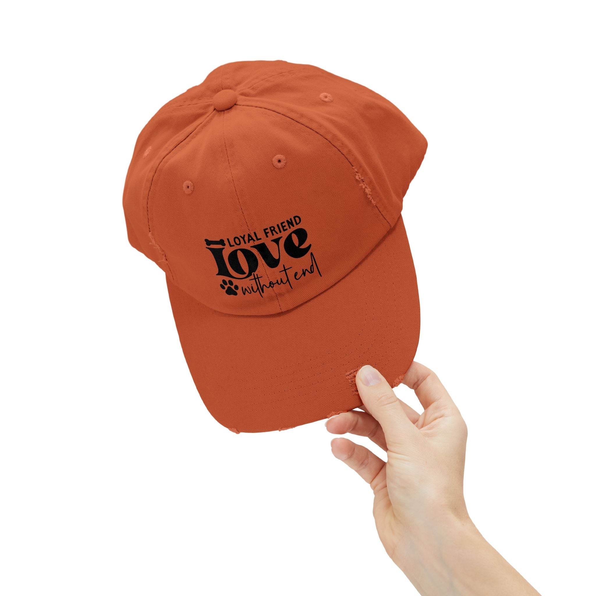 Printify orange baseball cap with paw print love graphic held by hand eco-friendly pet lover hat for animal owners