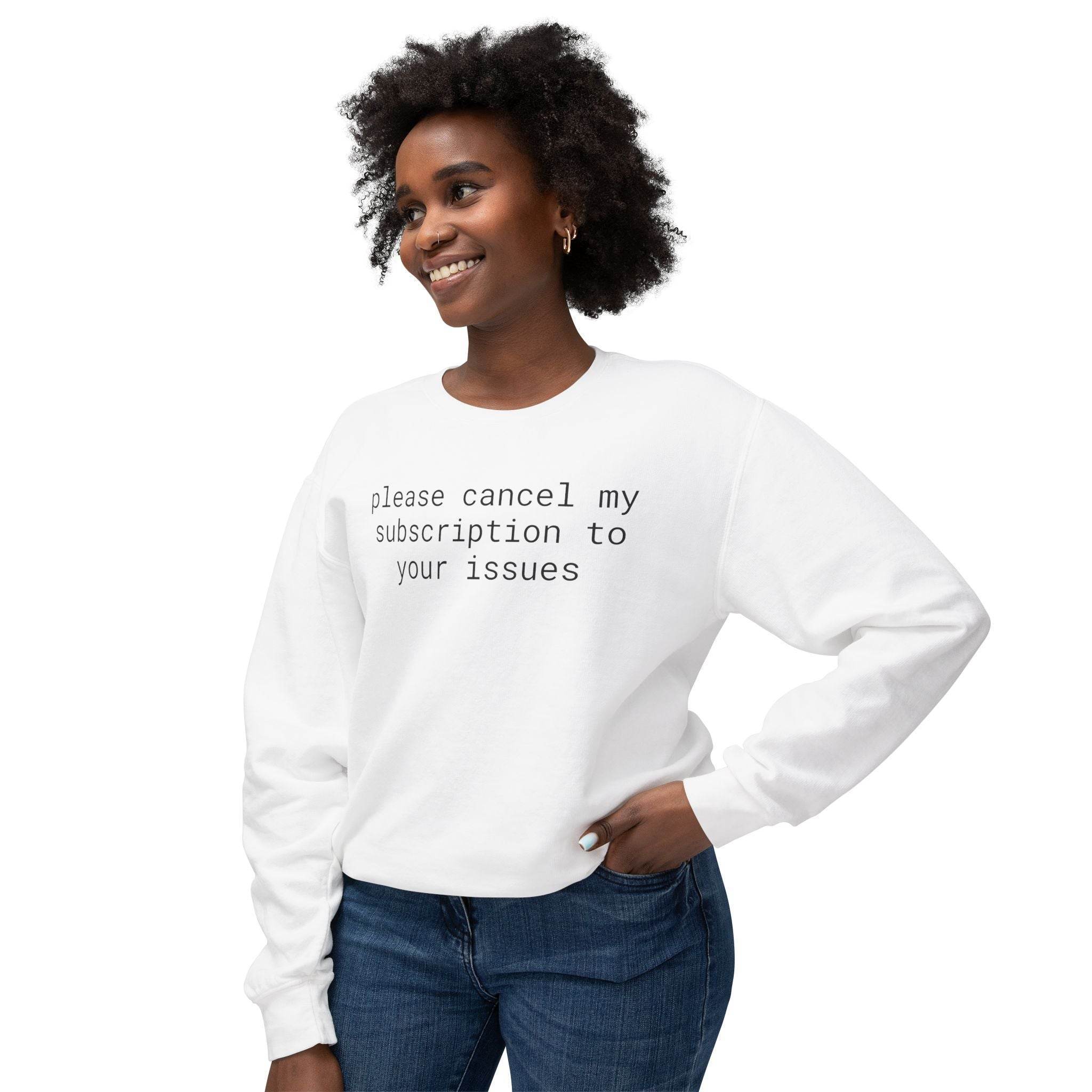 eco-friendly funny sweatshirt white crew with black text please cancel my subscription to your issues on smiling woman in jeans