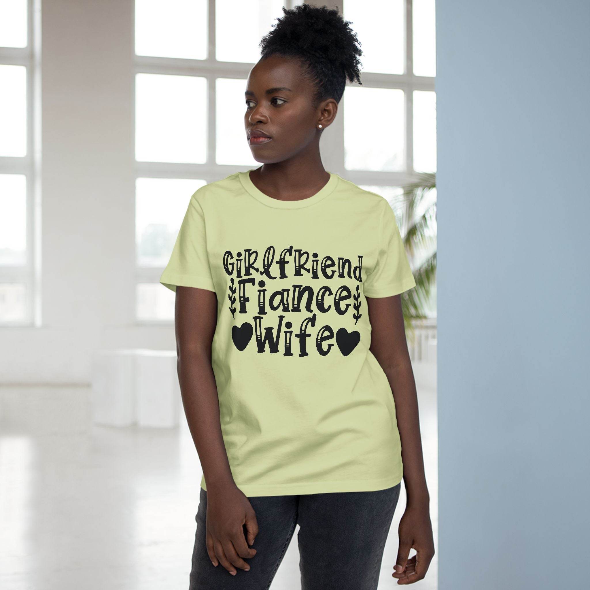 Printify model wearing eco-friendly women's relationship tee light green with black Girlfriend Fiance Wife design
