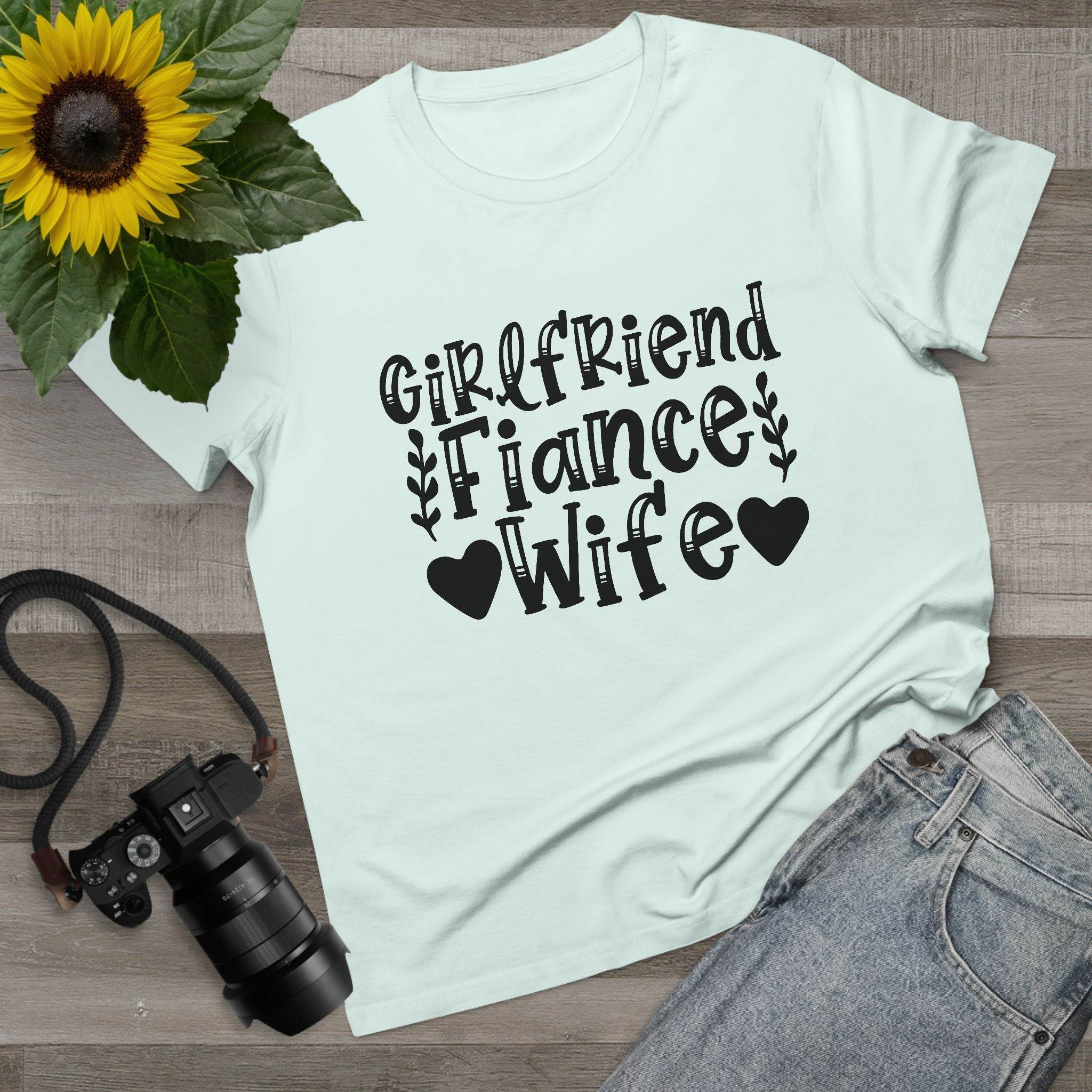 Printify eco-friendly women's relationship tee white shirt with Girlfriend Fiance Wife black text and hearts flatlay