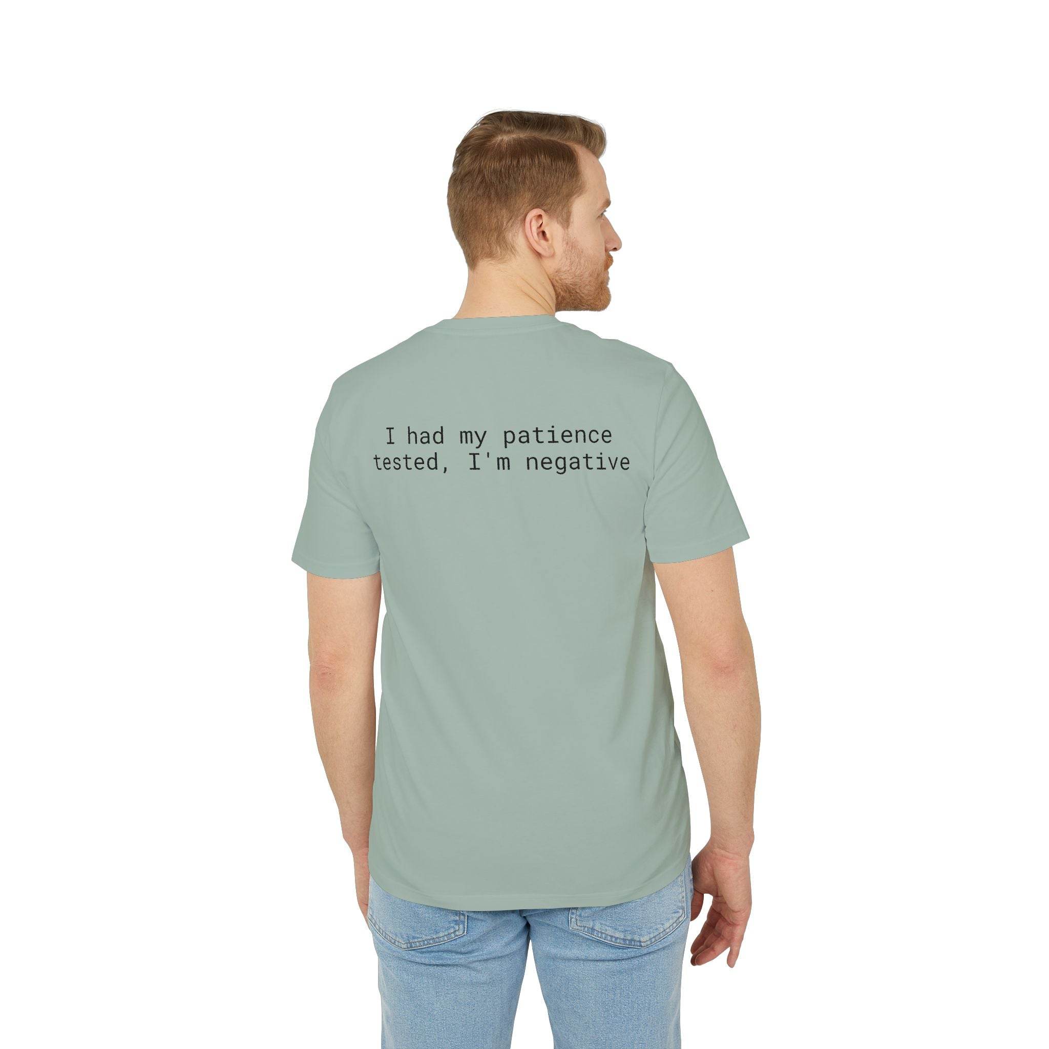 Back view of man wearing sage green eco-friendly unisex t-shirt by Printify with printed text I had my patience tested Im negative